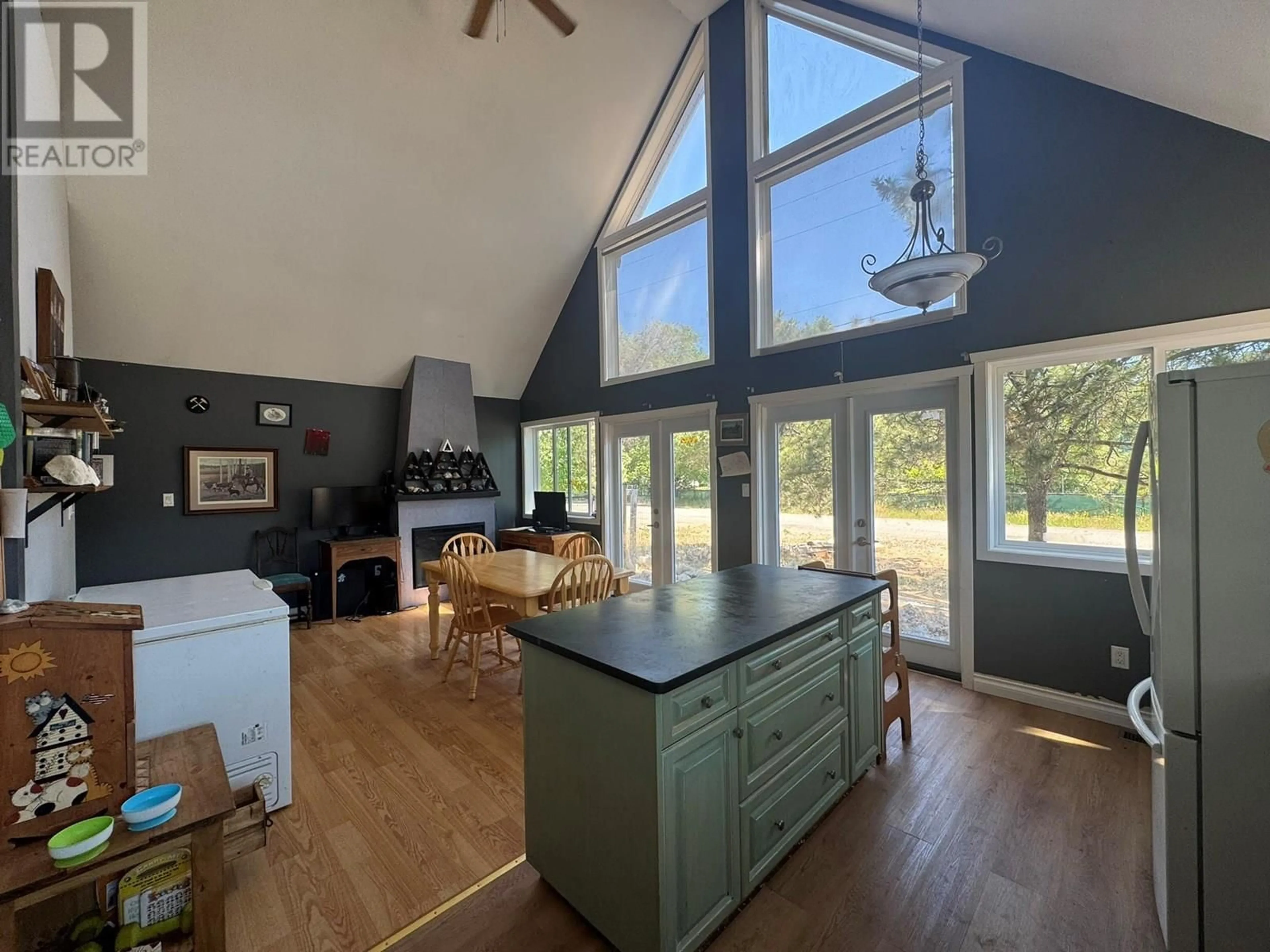 Open concept kitchen, wood/laminate floor for 242 CEMENT STREET, Princeton British Columbia V0X1W0