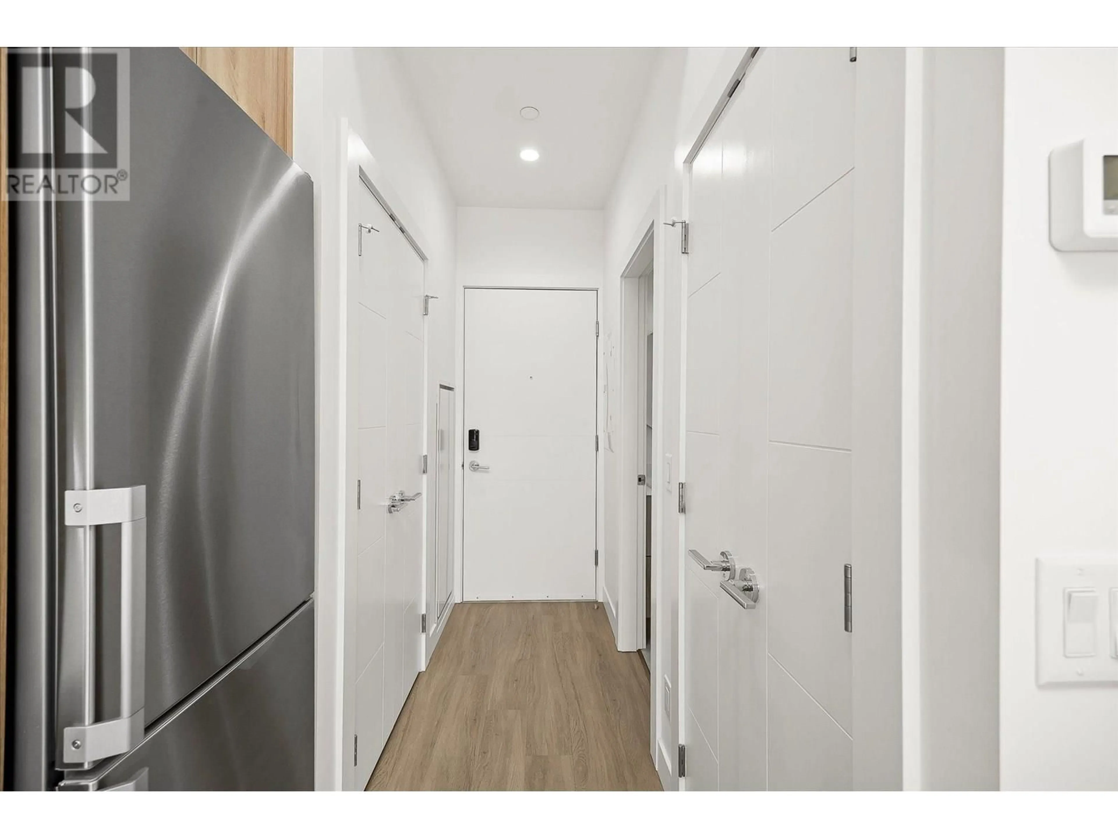 Indoor entryway for 102 - 3699 CAPOZZI ROAD, Kelowna British Columbia V1W0G3