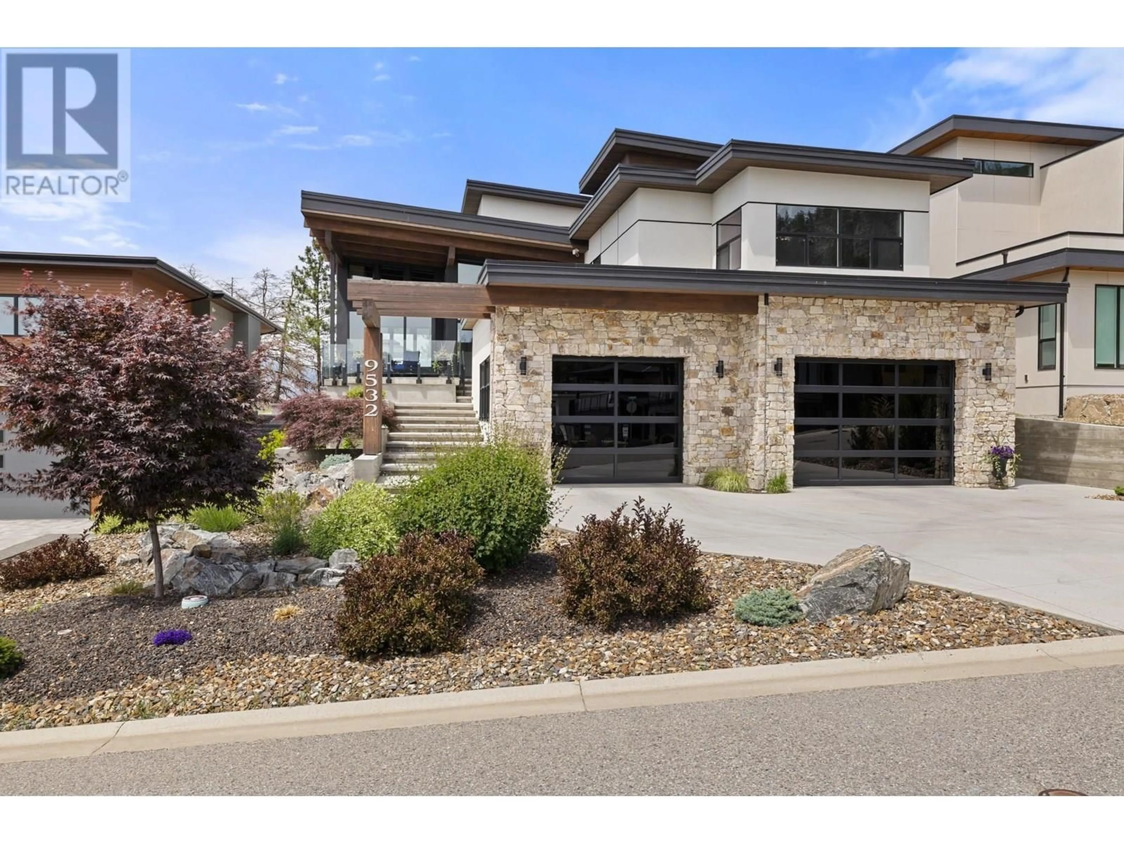 Home with brick exterior material, street for 9532 BENCHLAND DRIVE, Lake Country British Columbia V4V2T4