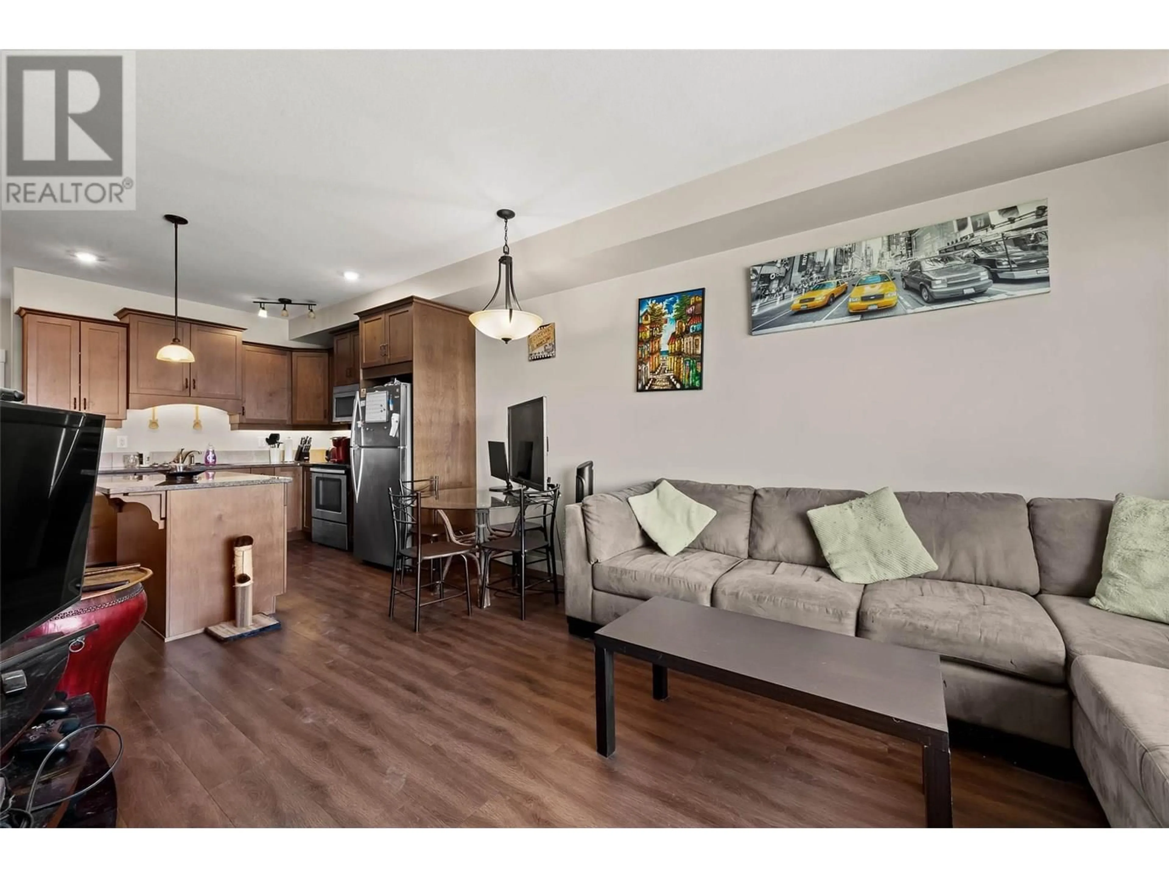Open concept kitchen, wood/laminate floor for 411 - 755 MCGILL ROAD, Kamloops British Columbia V2C0B6