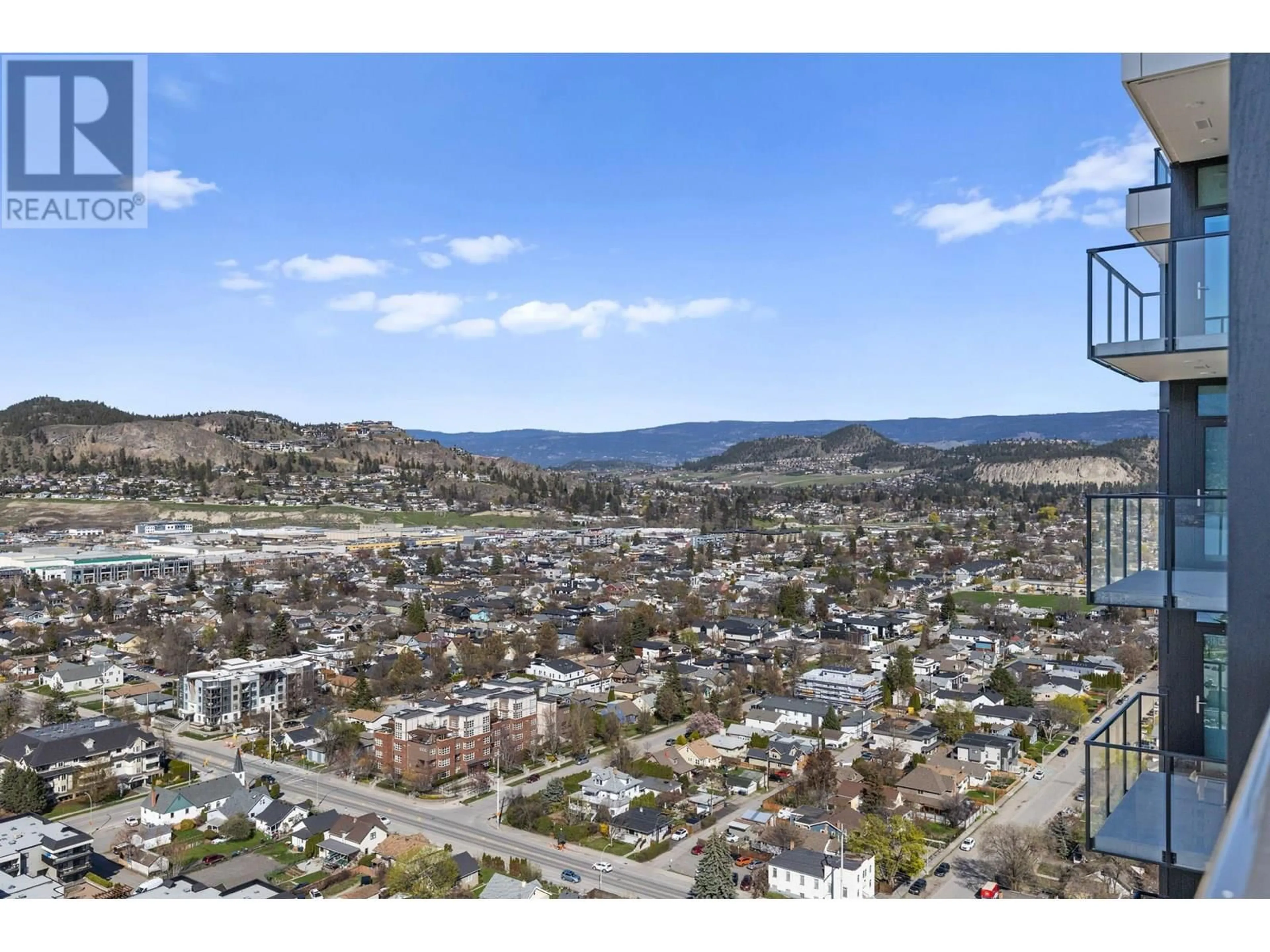 A pic from outside/outdoor area/front of a property/back of a property/a pic from drone, mountain view for 2910 - 1488 BERTRAM STREET, Kelowna British Columbia V1Y0M6