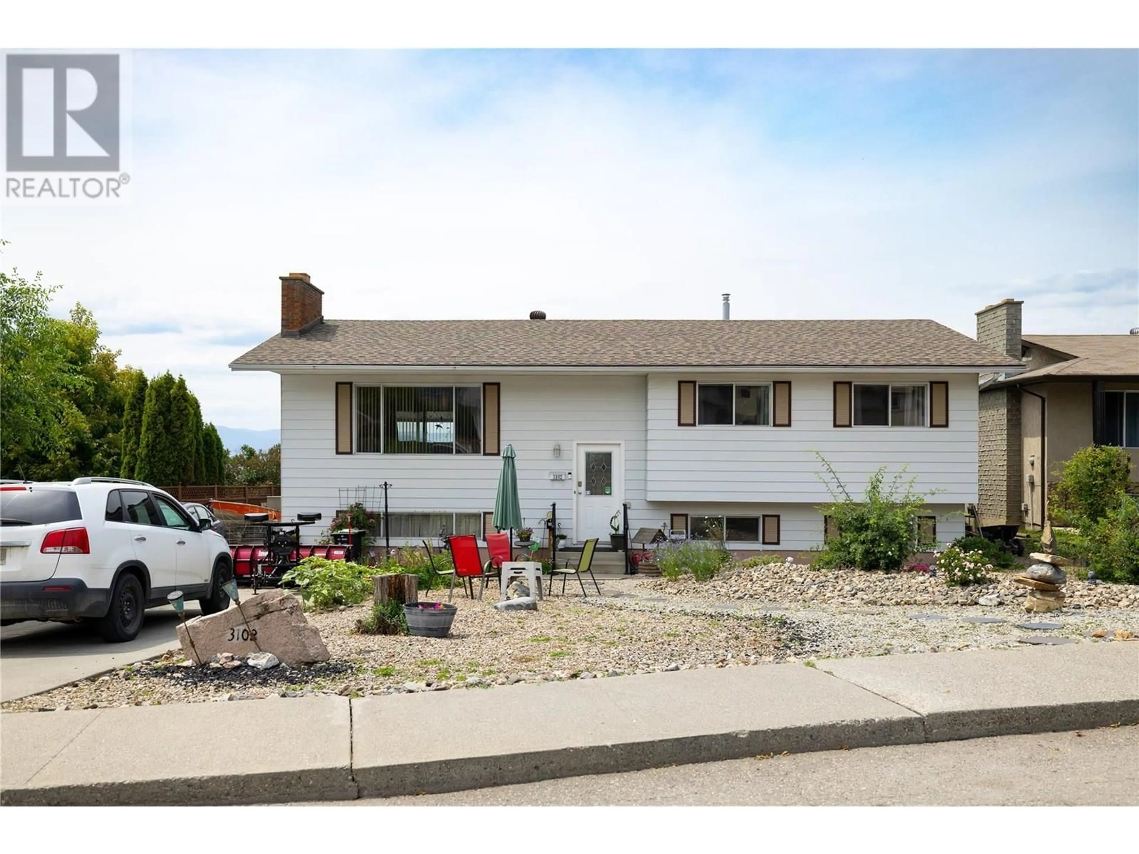 Home with vinyl exterior material, street for 3102 13 STREET, Vernon British Columbia V1T4G4