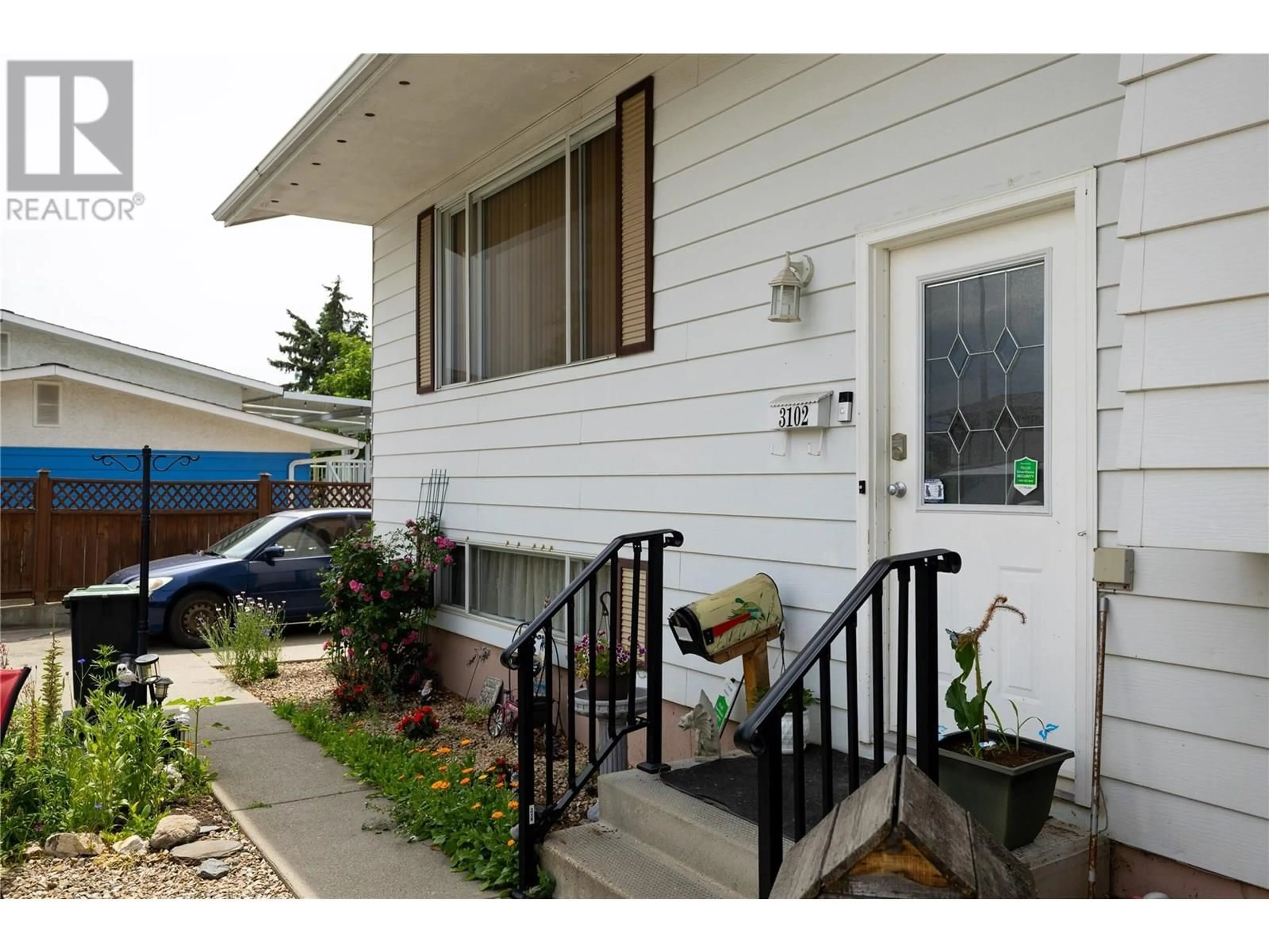 Home with vinyl exterior material, street for 3102 13 STREET, Vernon British Columbia V1T4G4