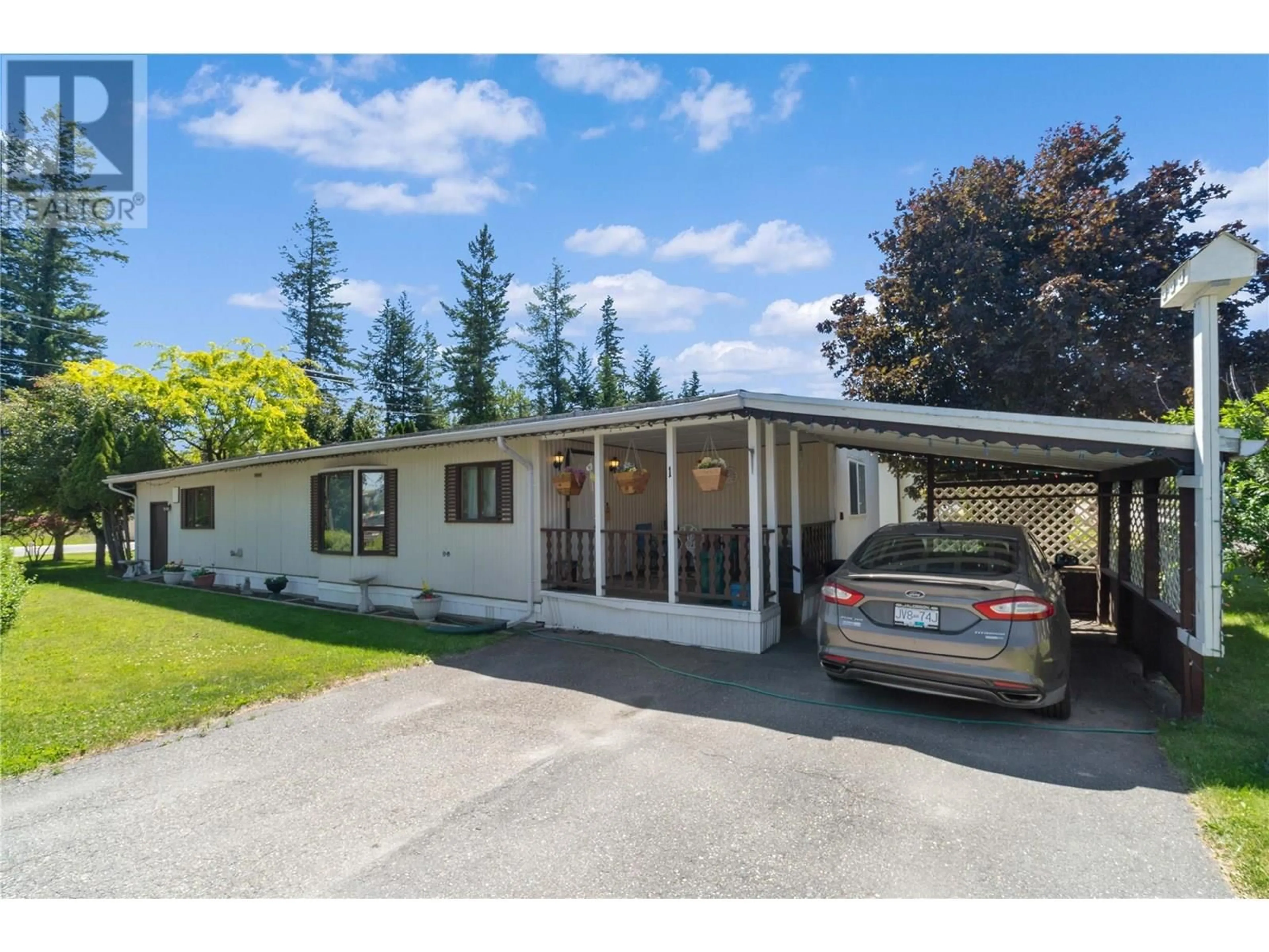 Home with vinyl exterior material, street for 1 - 1361 30 STREET SOUTHEAST, Salmon Arm British Columbia V1E2N4