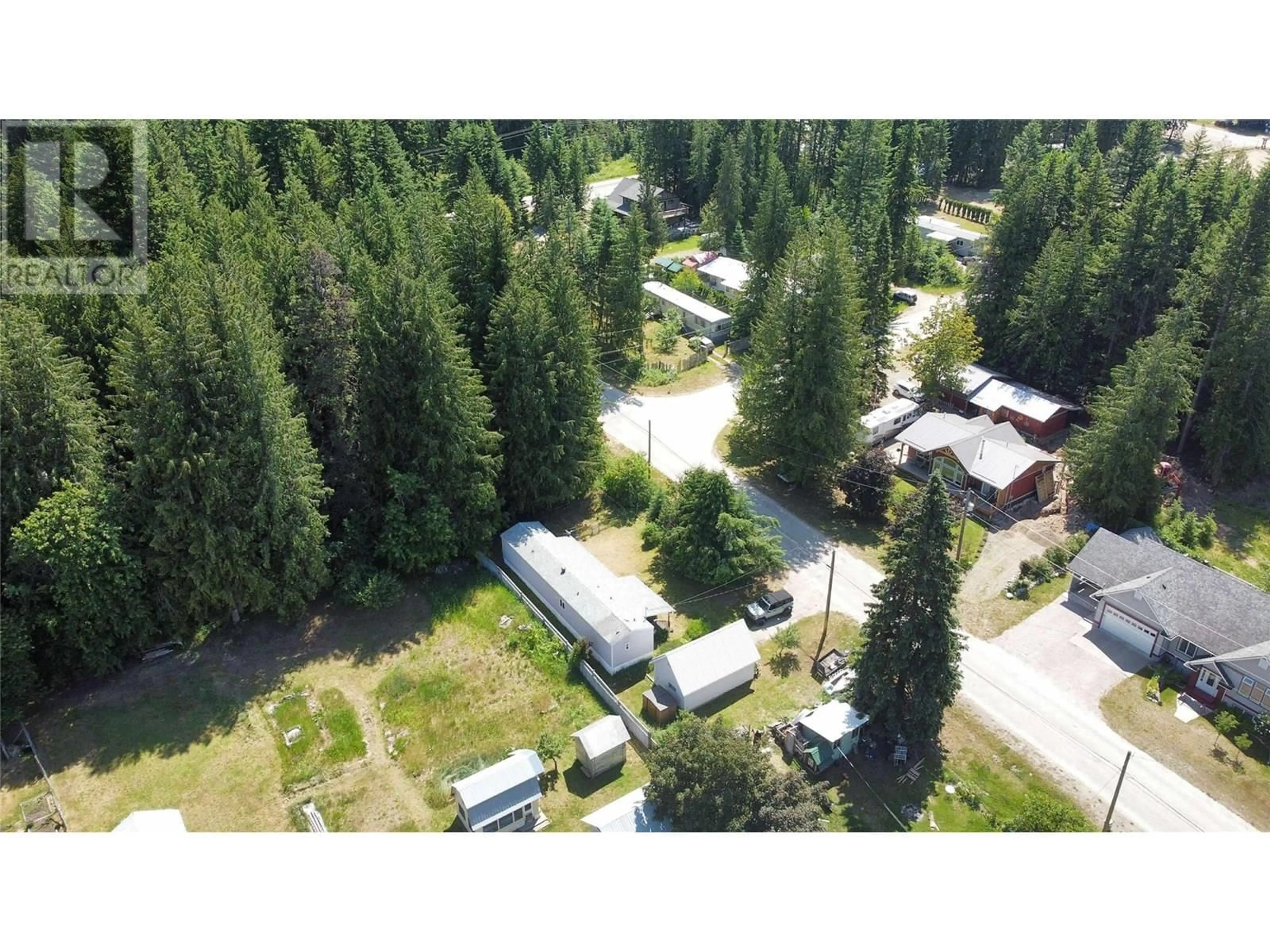 A pic from outside/outdoor area/front of a property/back of a property/a pic from drone, forest/trees view for 612 FLETCHER AVENUE, Slocan British Columbia V0G2C0