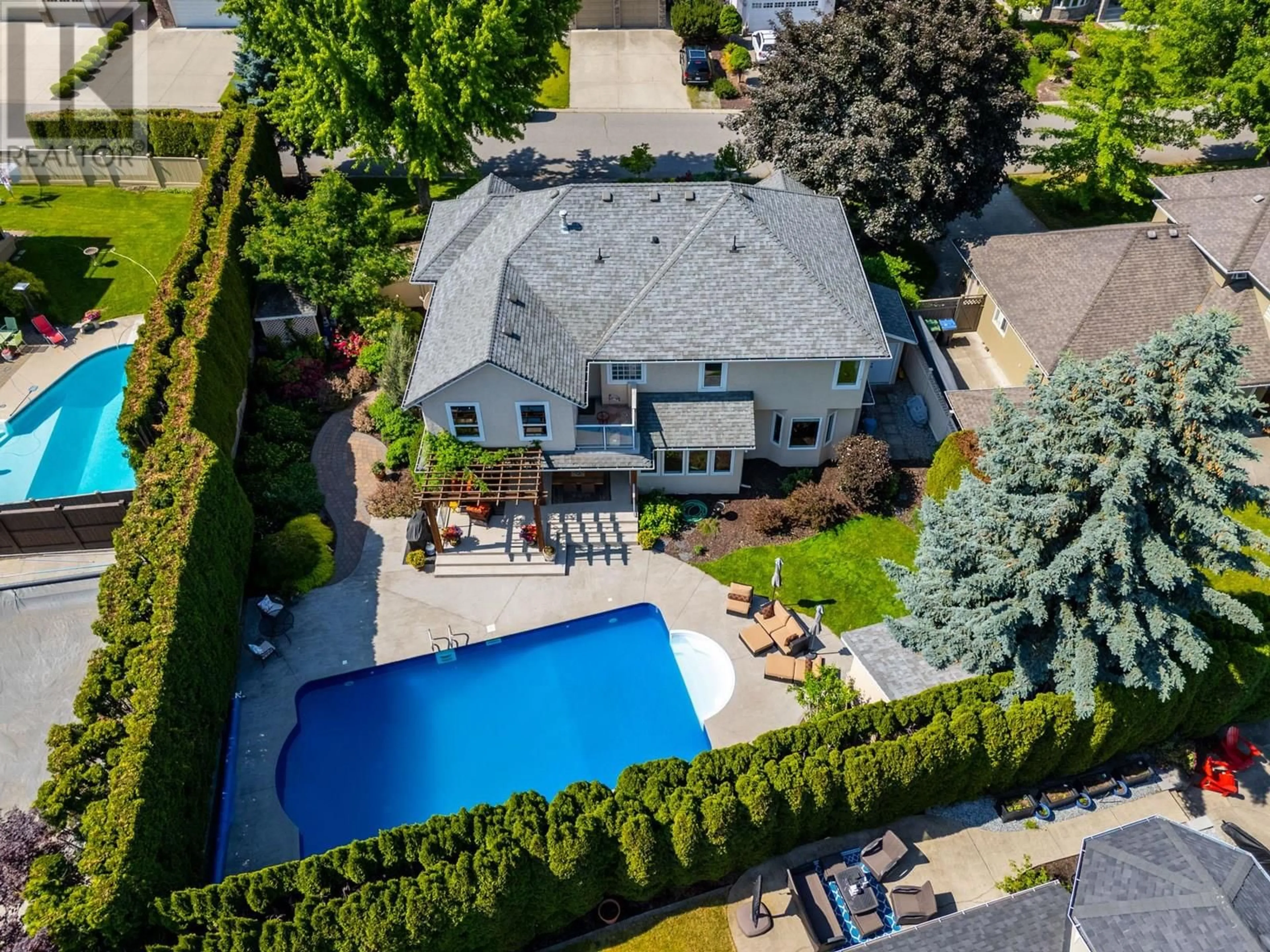 A pic from outside/outdoor area/front of a property/back of a property/a pic from drone, street for 464 CASCIA DRIVE, Kelowna British Columbia V1W3C7