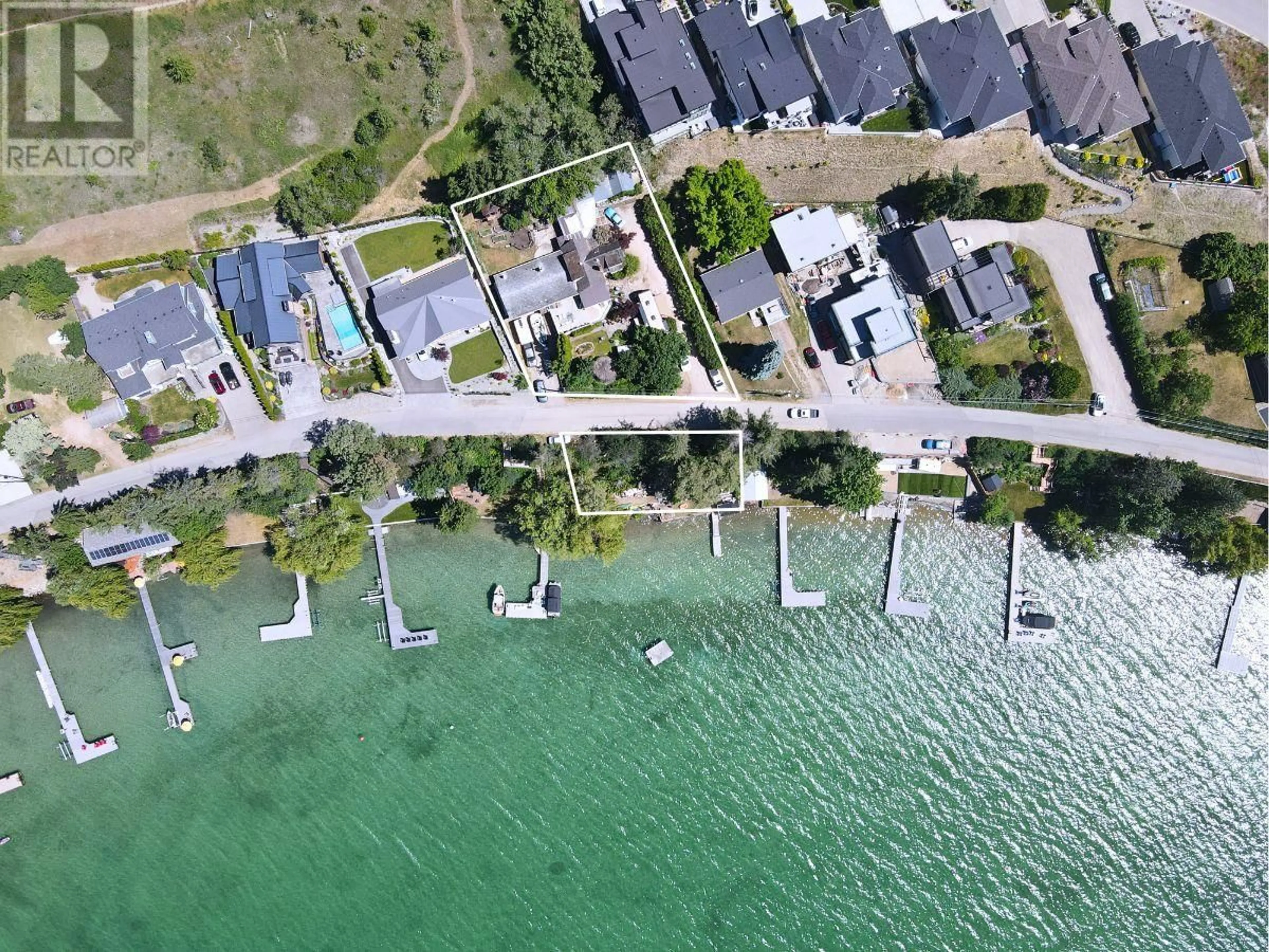 A pic from outside/outdoor area/front of a property/back of a property/a pic from drone, water/lake/river/ocean view for 15911 TRASK ROAD, Lake Country British Columbia V4V2H9