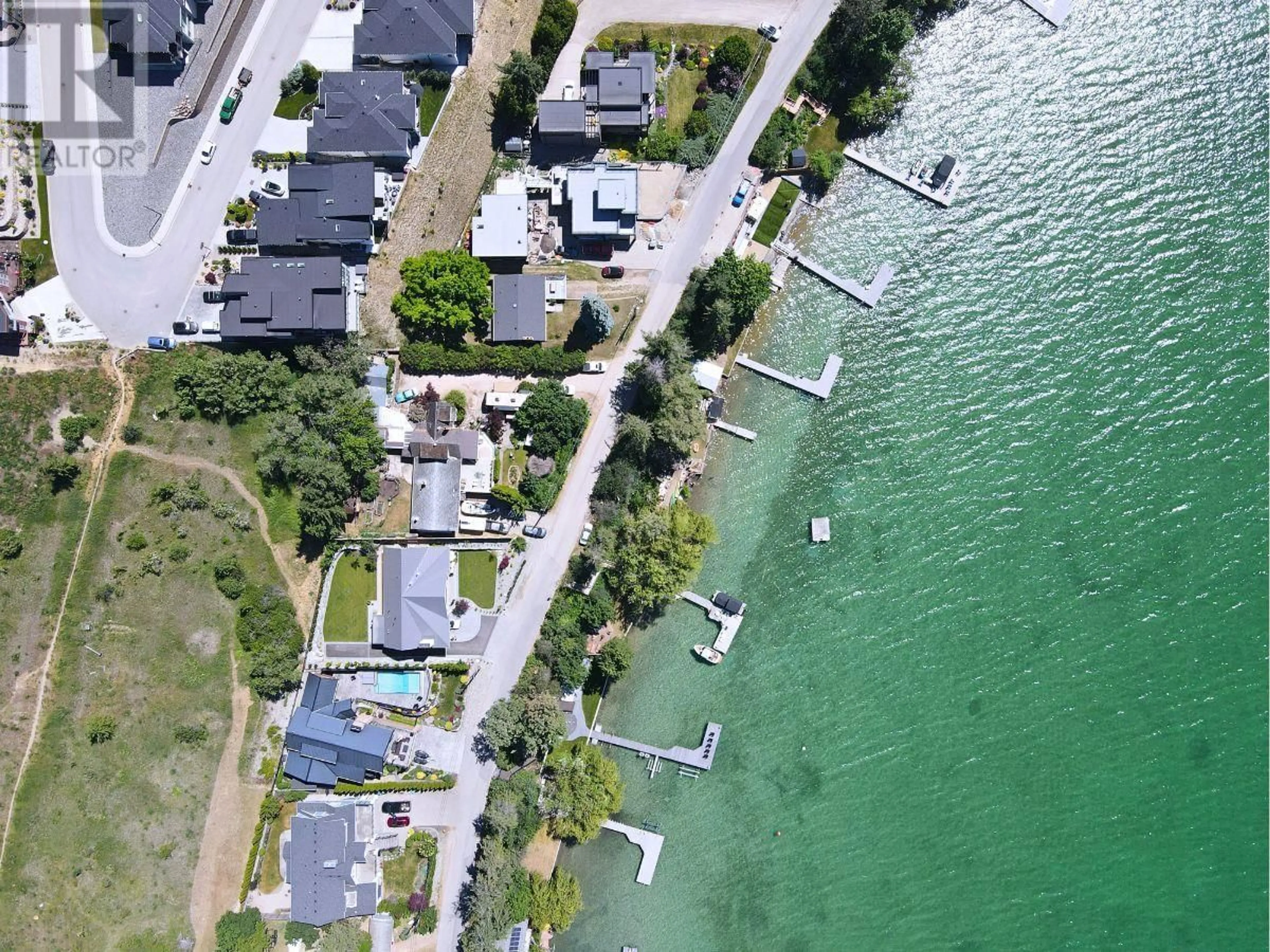 A pic from outside/outdoor area/front of a property/back of a property/a pic from drone, water/lake/river/ocean view for 15911 TRASK ROAD, Lake Country British Columbia V4V2H9