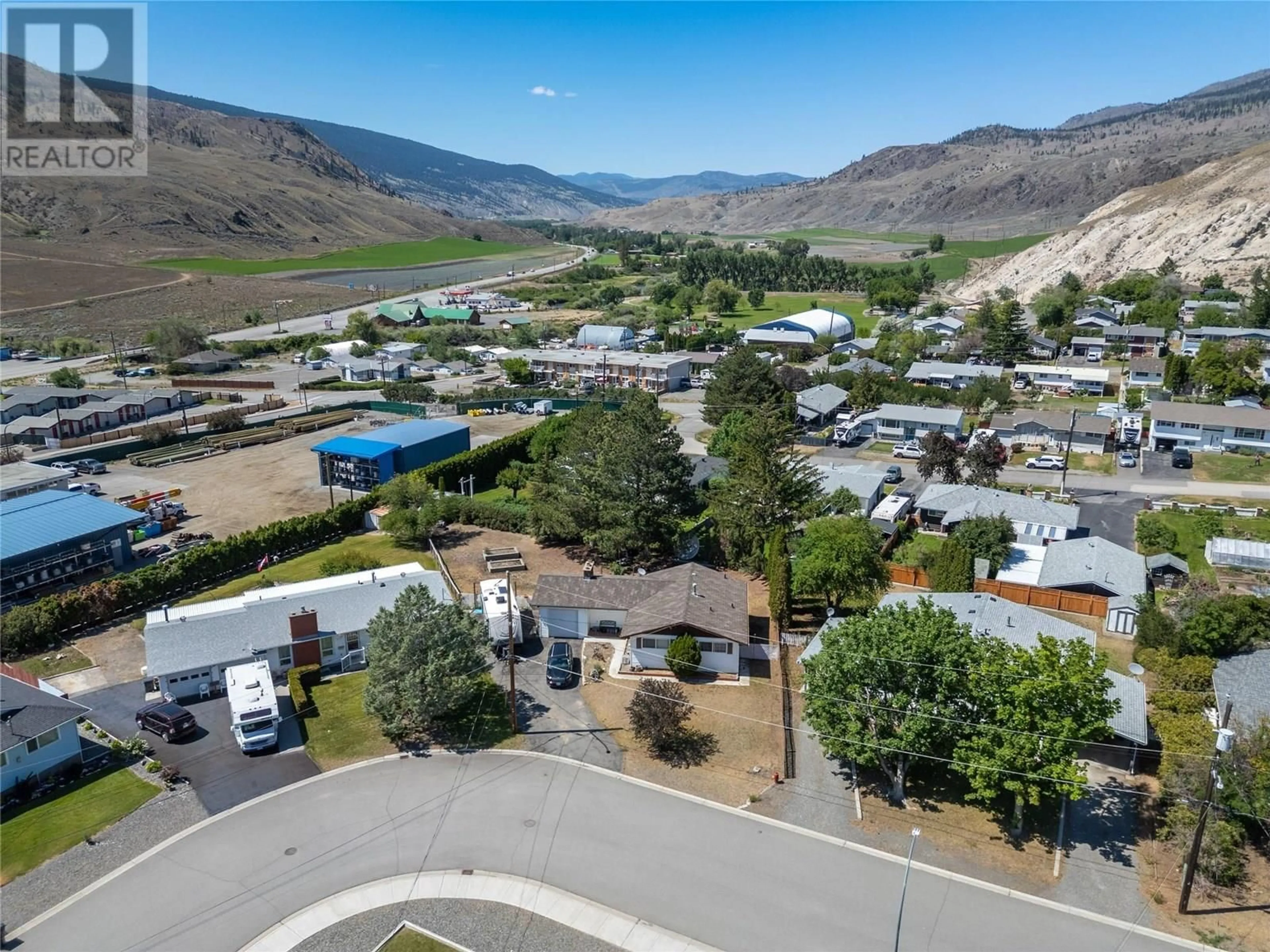 A pic from outside/outdoor area/front of a property/back of a property/a pic from drone, mountain view for 1111 MACLEAN CRESCENT, Cache Creek British Columbia V0K1H0