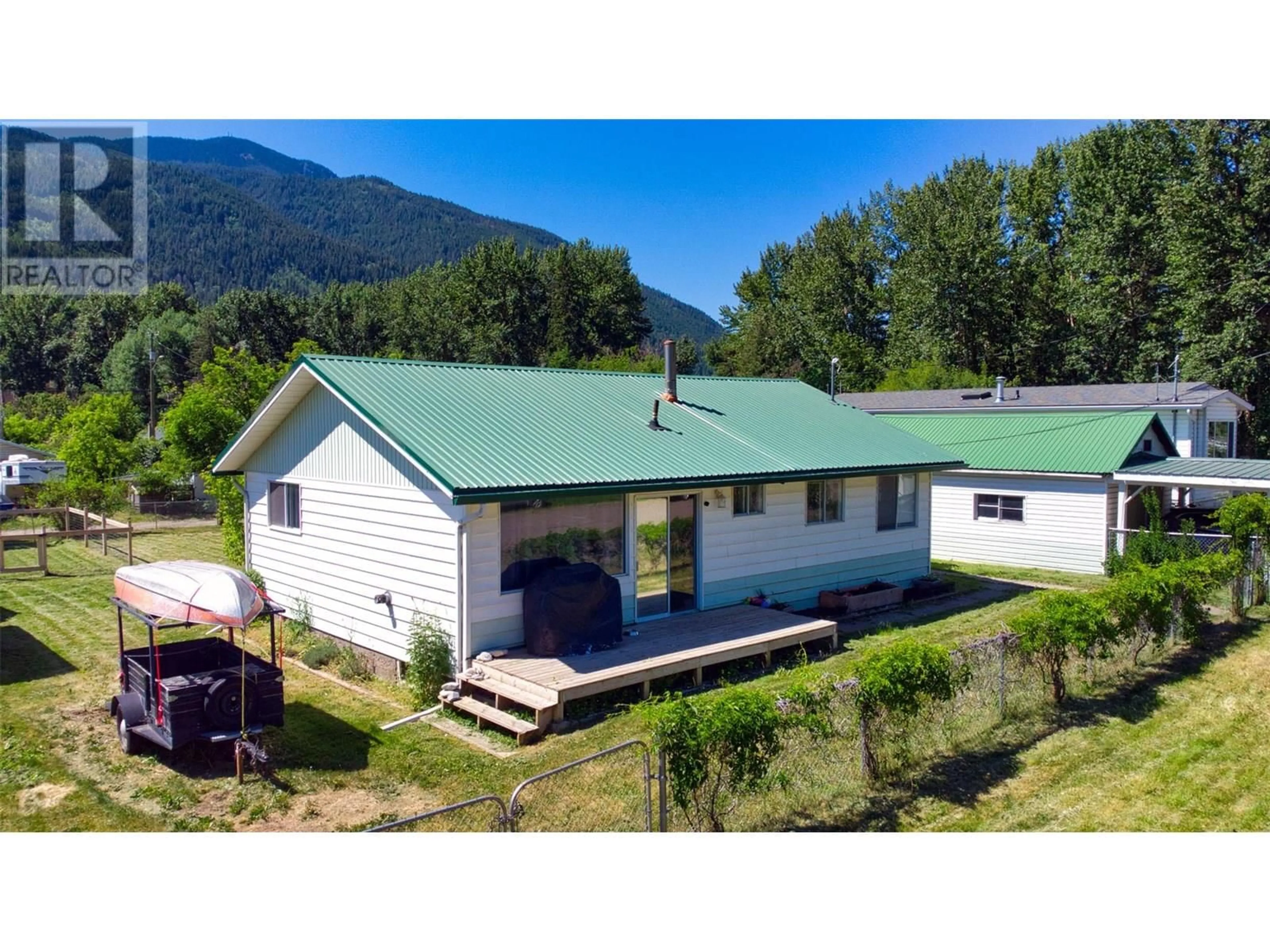 A pic from outside/outdoor area/front of a property/back of a property/a pic from drone, mountain view for 5783 PONDEROSA ROAD, Falkland British Columbia V0E1W0