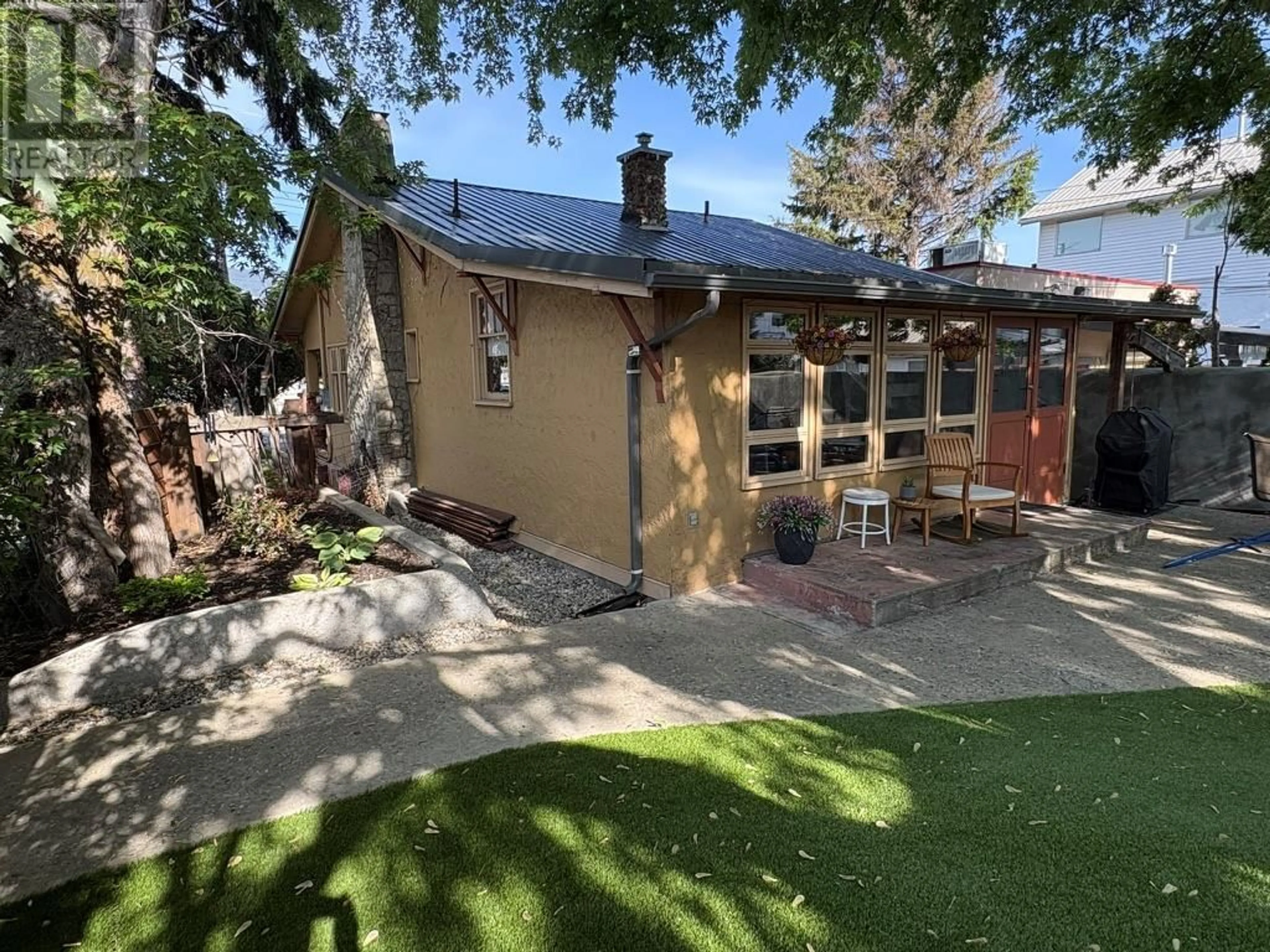 A pic from outside/outdoor area/front of a property/back of a property/a pic from drone, street for 396 VAN HORNE STREET, Penticton British Columbia V2A4K5