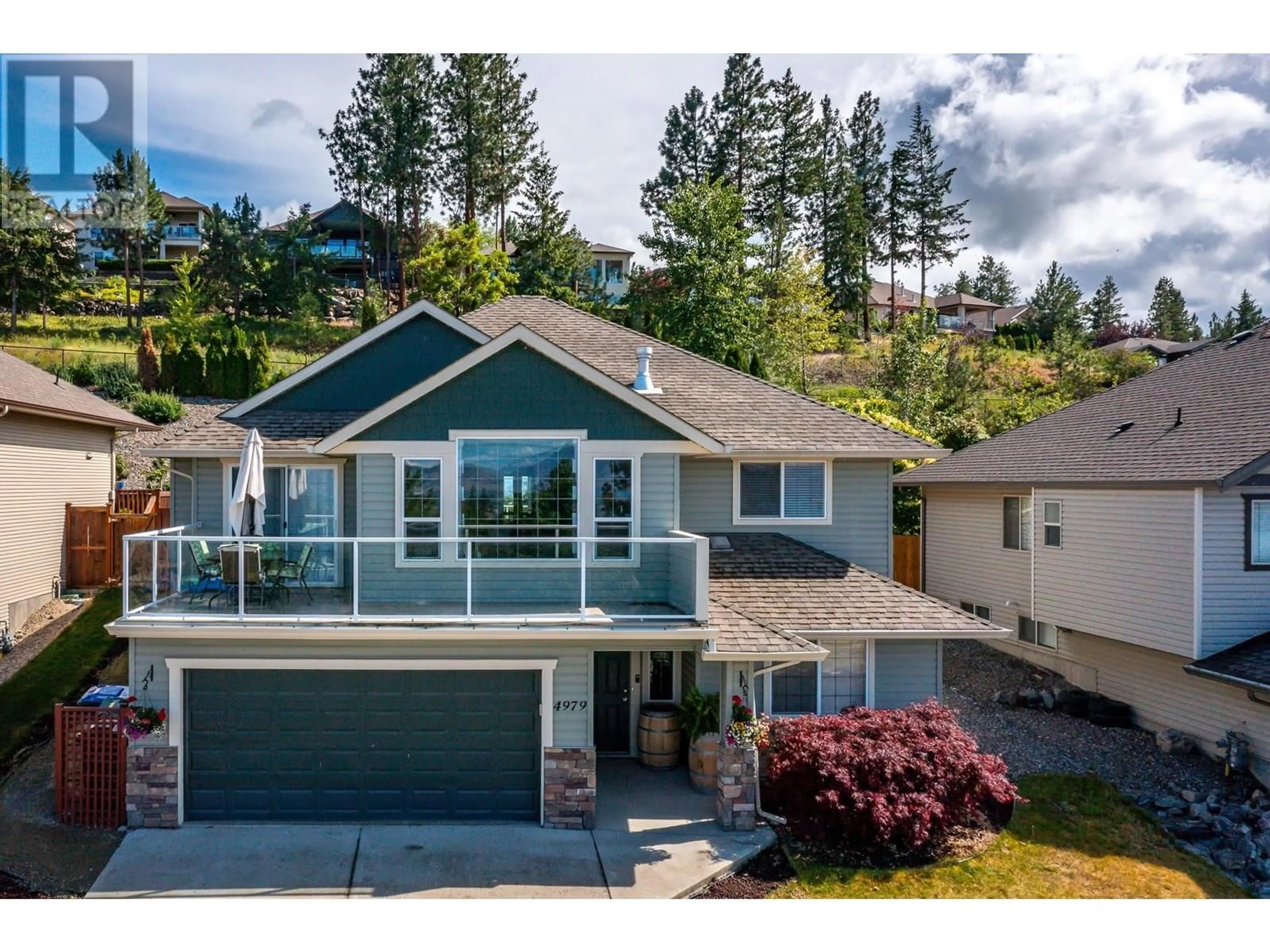 Home with vinyl exterior material, unknown for 4979 WINDSONG CRESCENT, Kelowna British Columbia V1W5C4