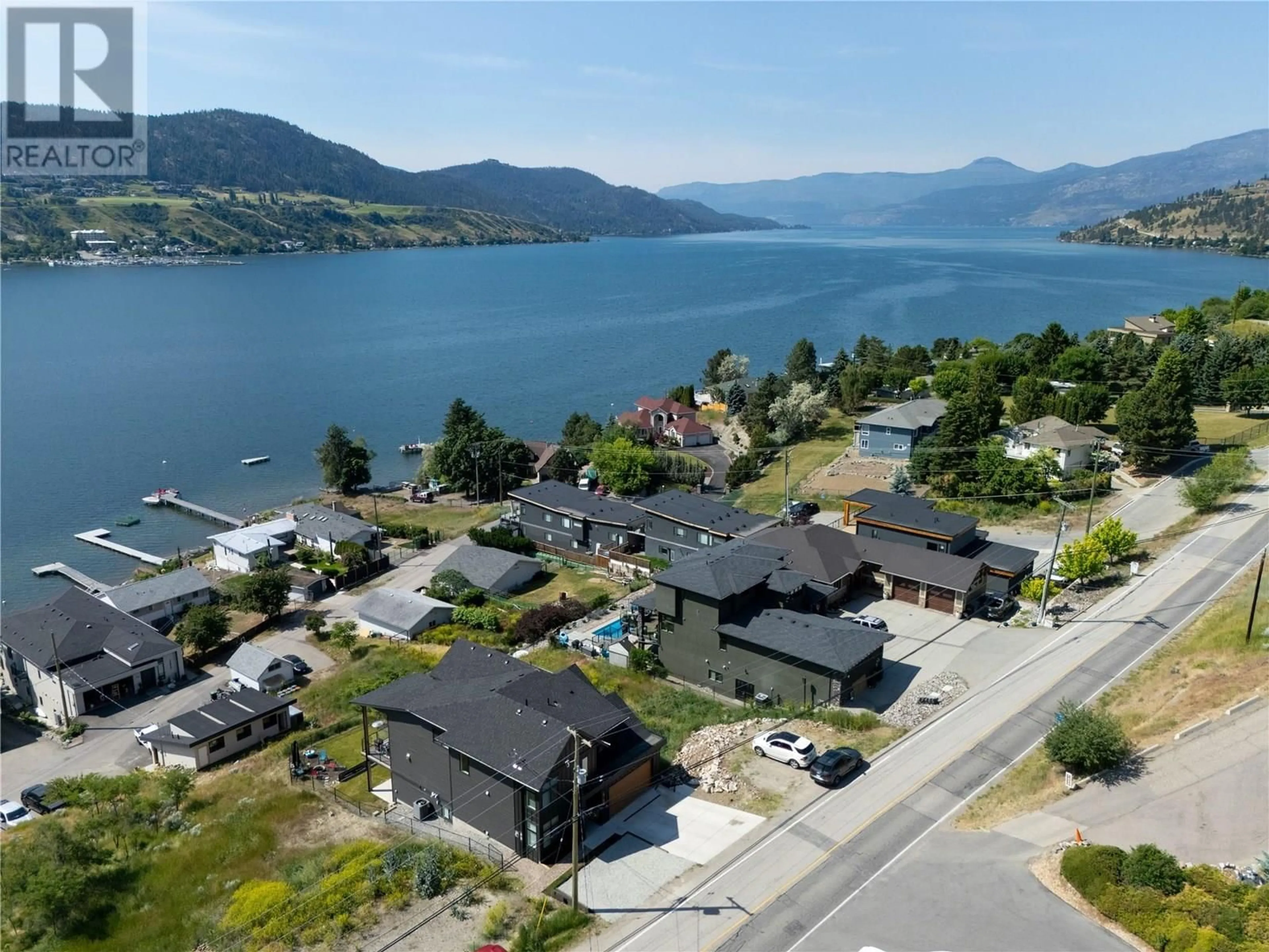 A pic from outside/outdoor area/front of a property/back of a property/a pic from drone, water/lake/river/ocean view for 7476 TRONSON ROAD, Vernon British Columbia V1H1C3
