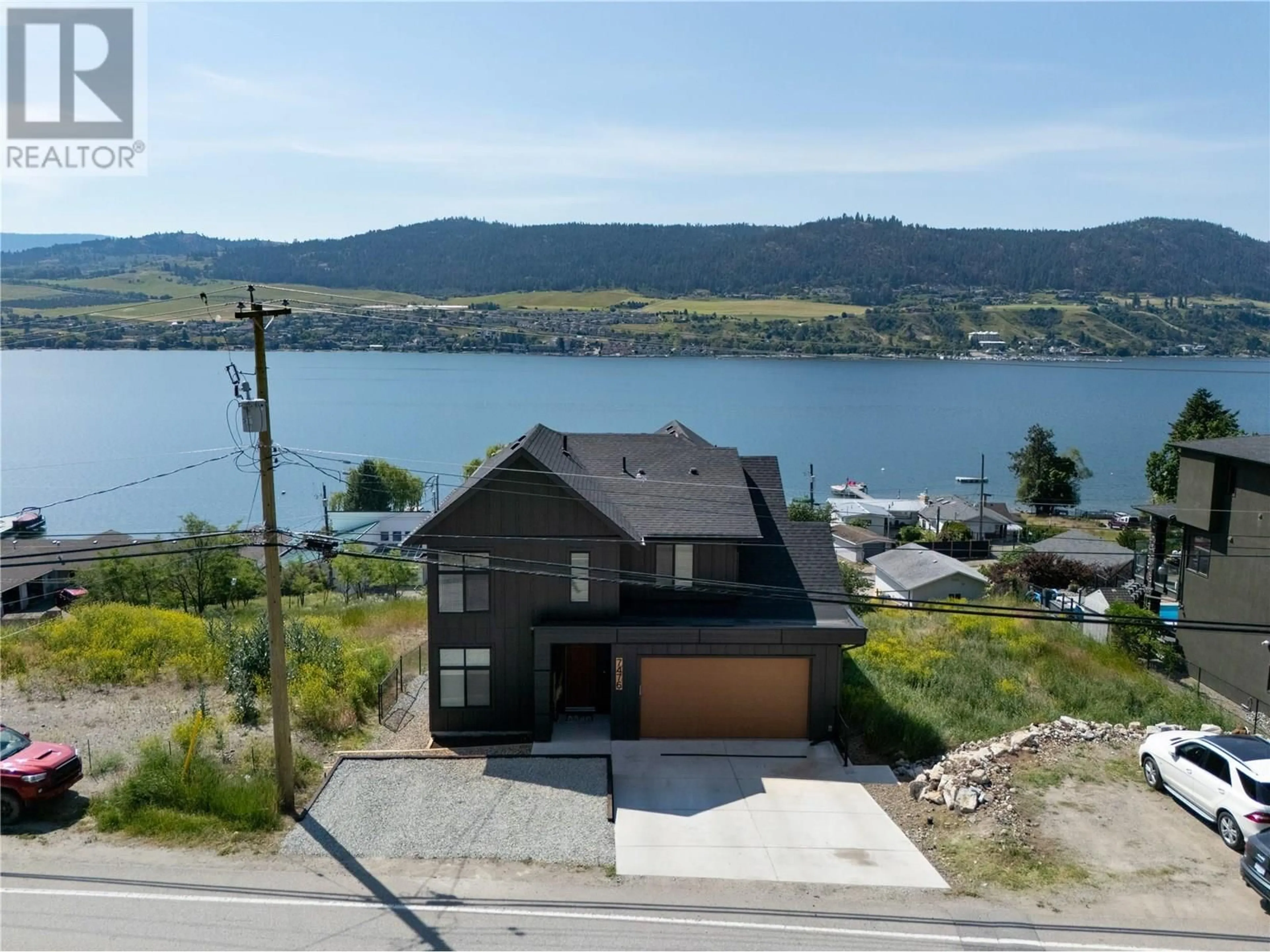 A pic from outside/outdoor area/front of a property/back of a property/a pic from drone, water/lake/river/ocean view for 7476 TRONSON ROAD, Vernon British Columbia V1H1C3