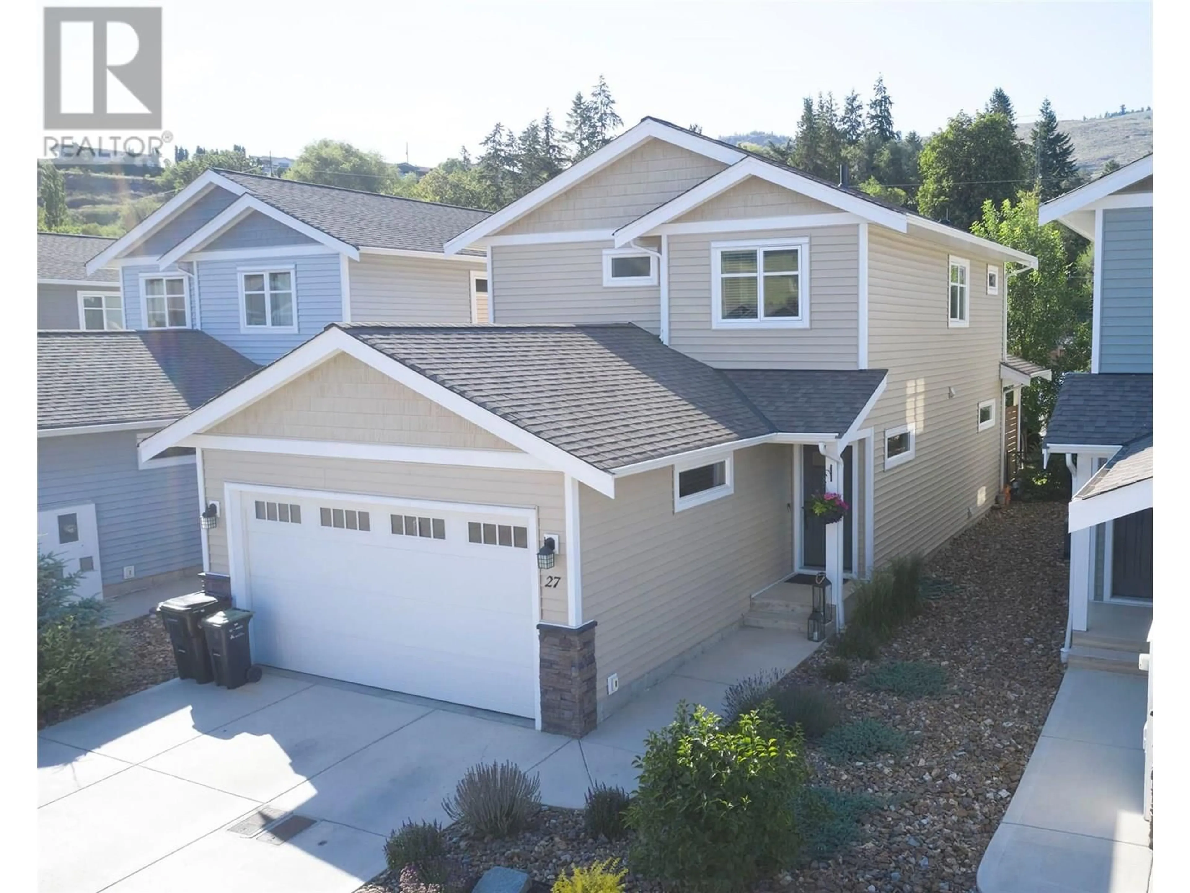 A pic from outside/outdoor area/front of a property/back of a property/a pic from drone, street for 27 - 6635 TRONSON ROAD, Vernon British Columbia V1H2K4