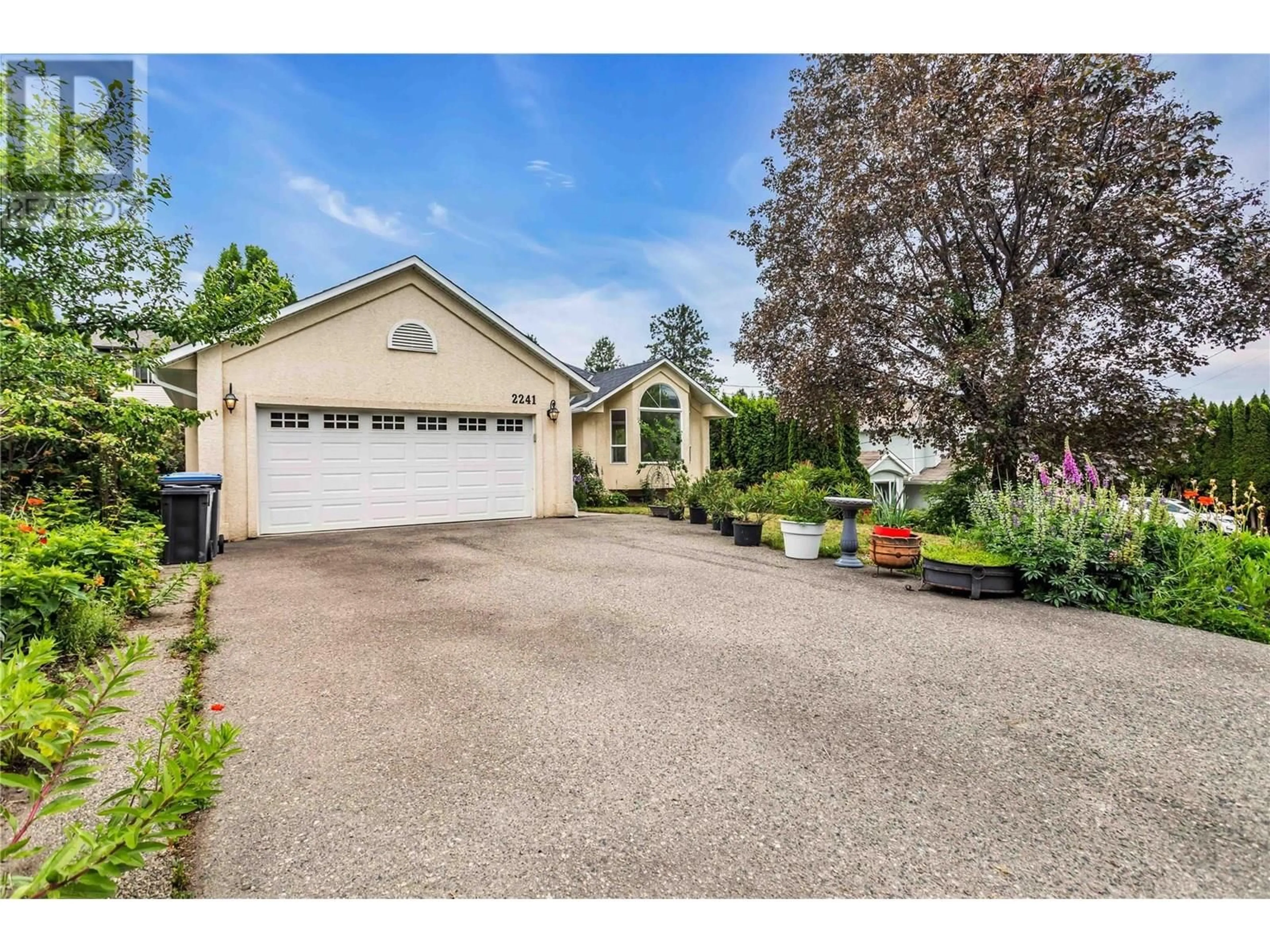 A pic from outside/outdoor area/front of a property/back of a property/a pic from drone, street for 2241 MAJOROS ROAD, West Kelowna British Columbia V4T2C2