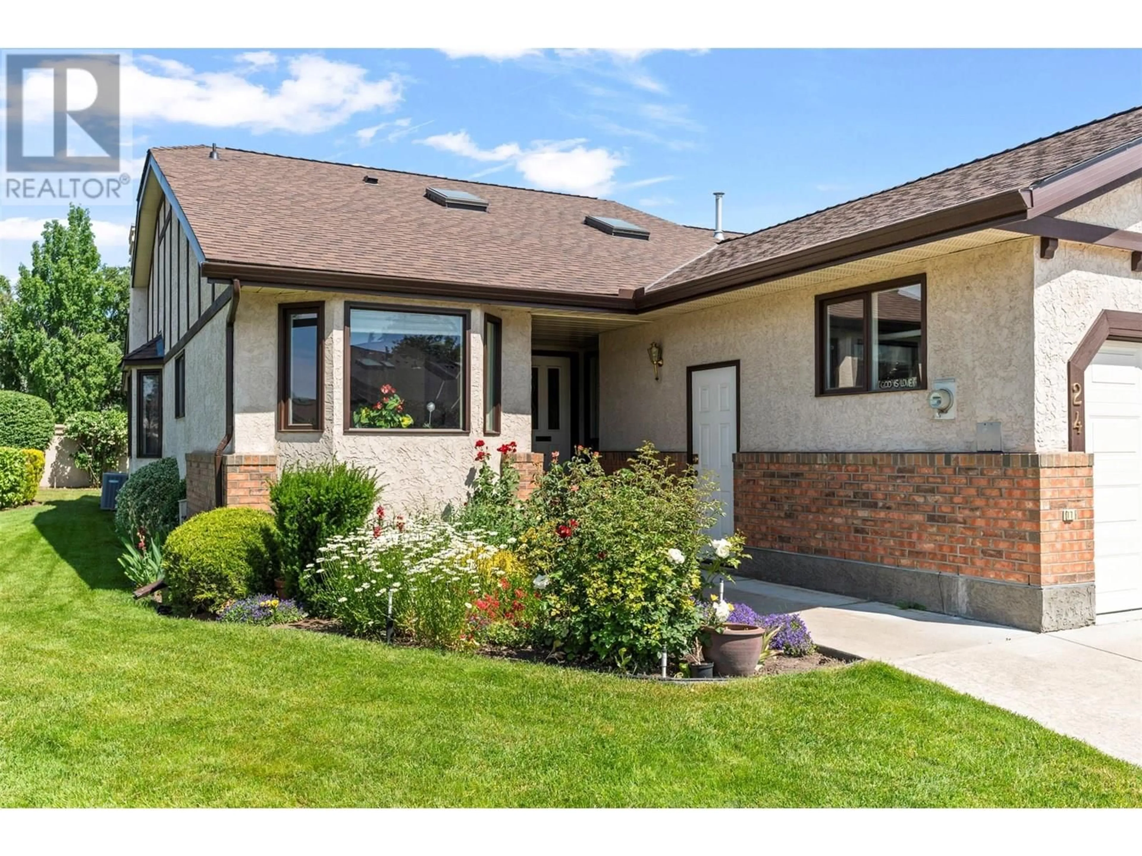 Home with brick exterior material, street for 24 - 2200 GORDON DRIVE, Kelowna British Columbia V1Y8T7