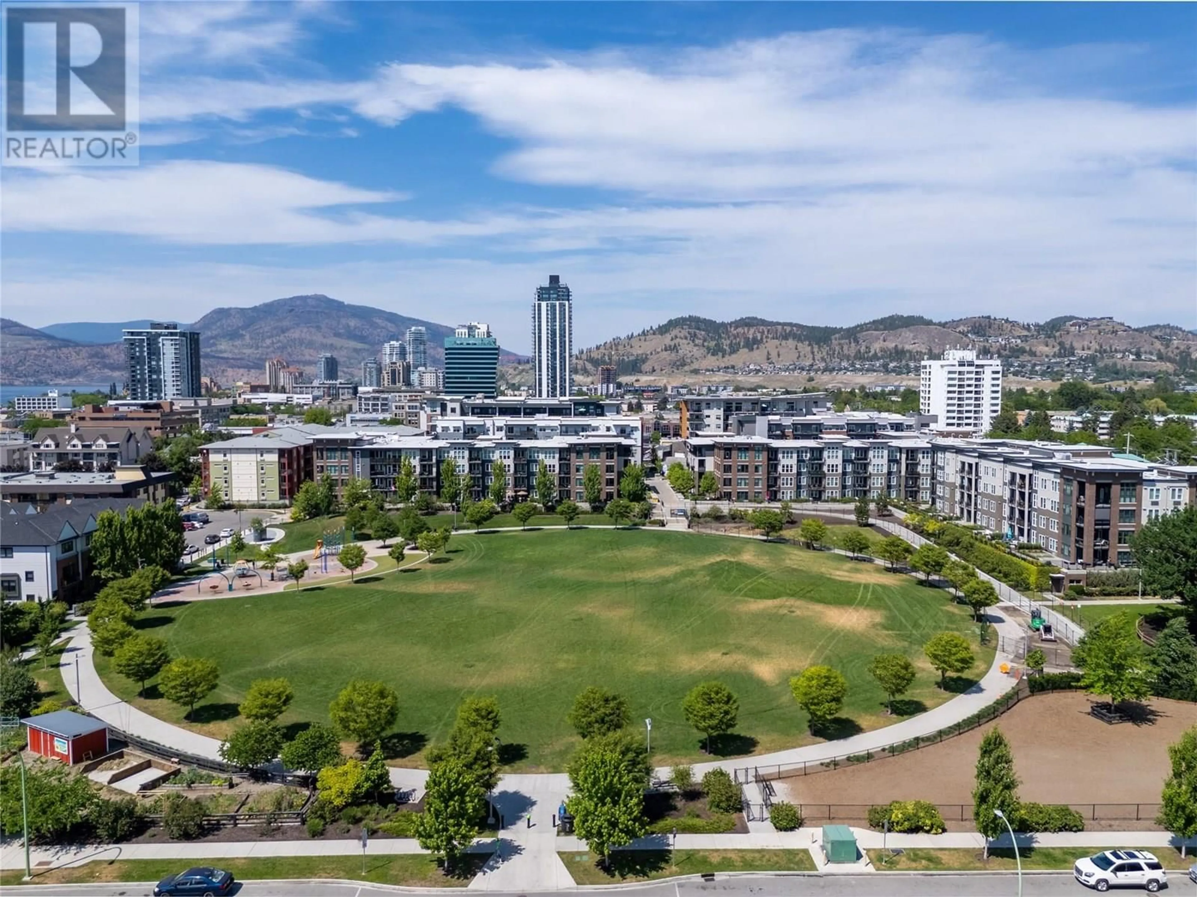 A pic from outside/outdoor area/front of a property/back of a property/a pic from drone, mountain view for 123 - 1770 RICHTER STREET, Kelowna British Columbia V1Y0E6
