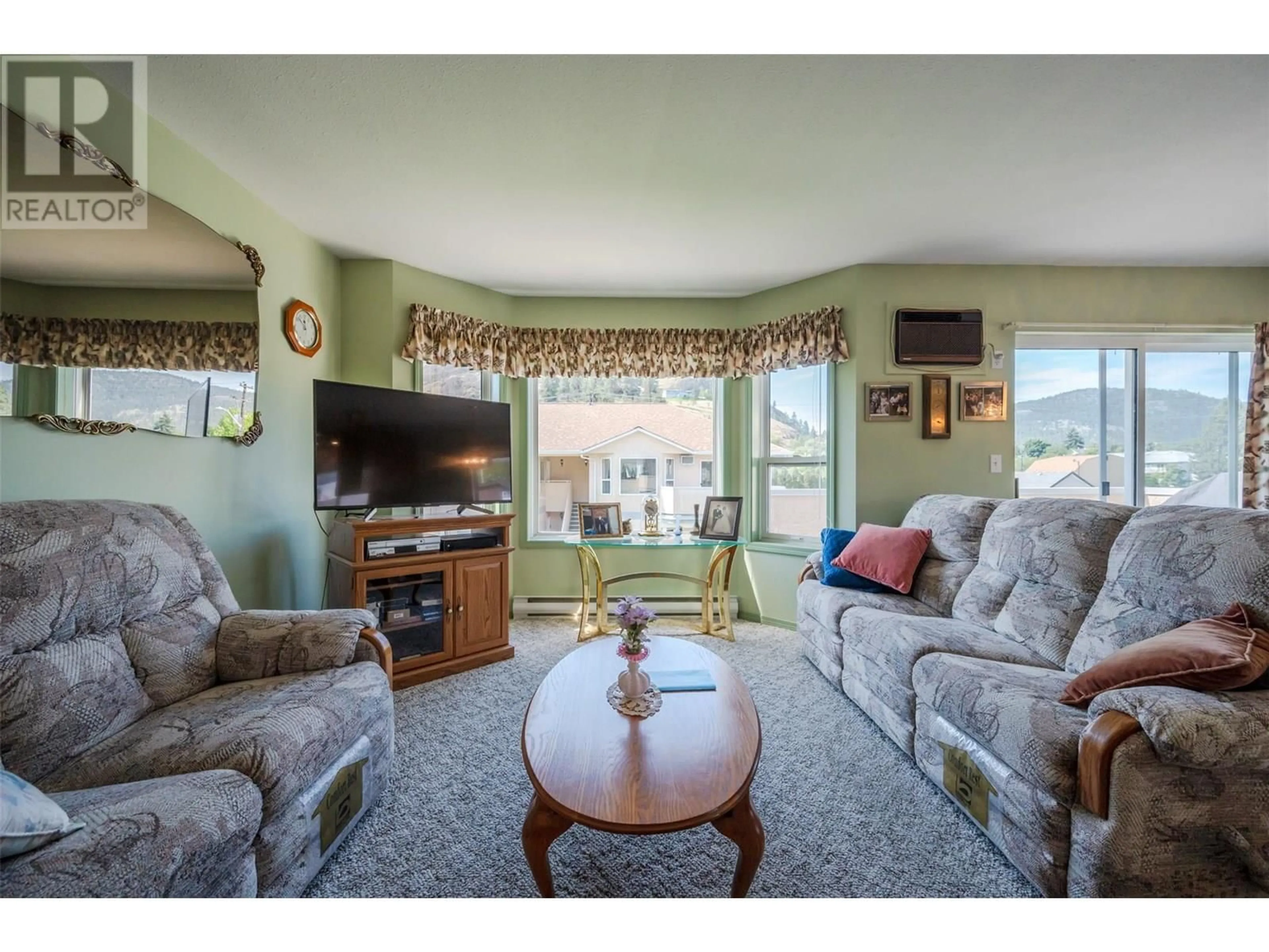 Living room with furniture, unknown for 205 - 13014 ARMSTRONG AVENUE, Summerland British Columbia V0H1Z0