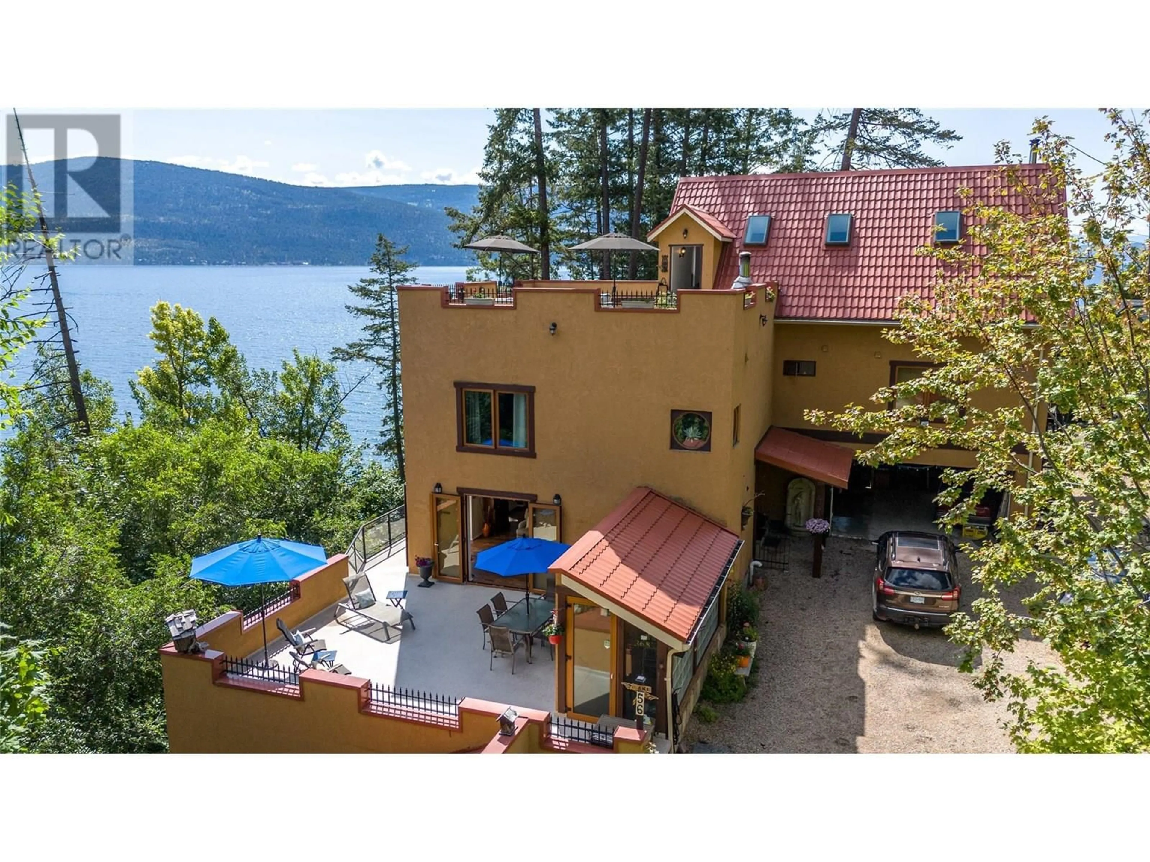 A pic from outside/outdoor area/front of a property/back of a property/a pic from drone, water/lake/river/ocean view for 56 NERIE ROAD, Vernon British Columbia V1H2E4