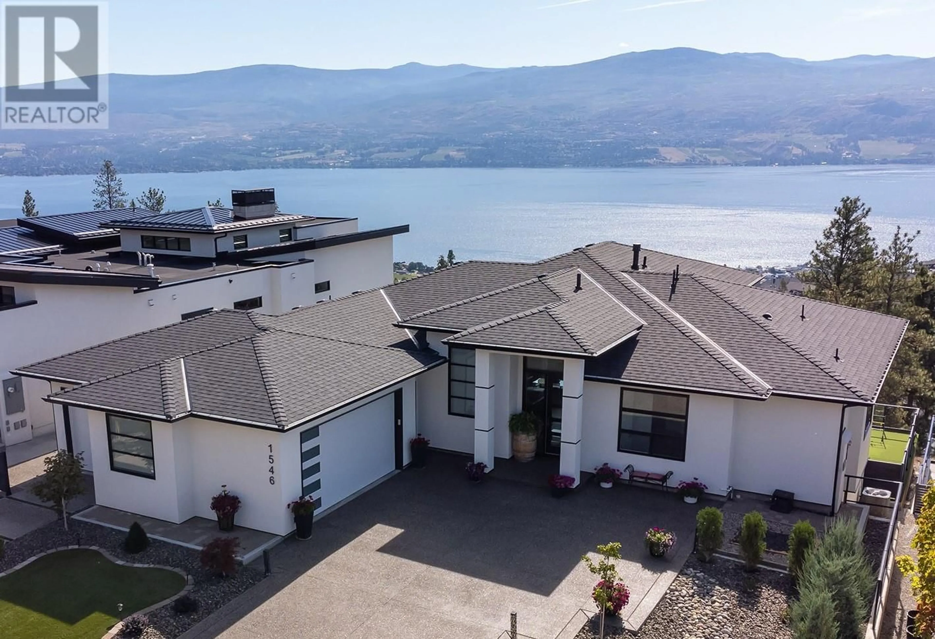 A pic from outside/outdoor area/front of a property/back of a property/a pic from drone, water/lake/river/ocean view for 1546 VIOGNIER DRIVE, West Kelowna British Columbia V4T0E1