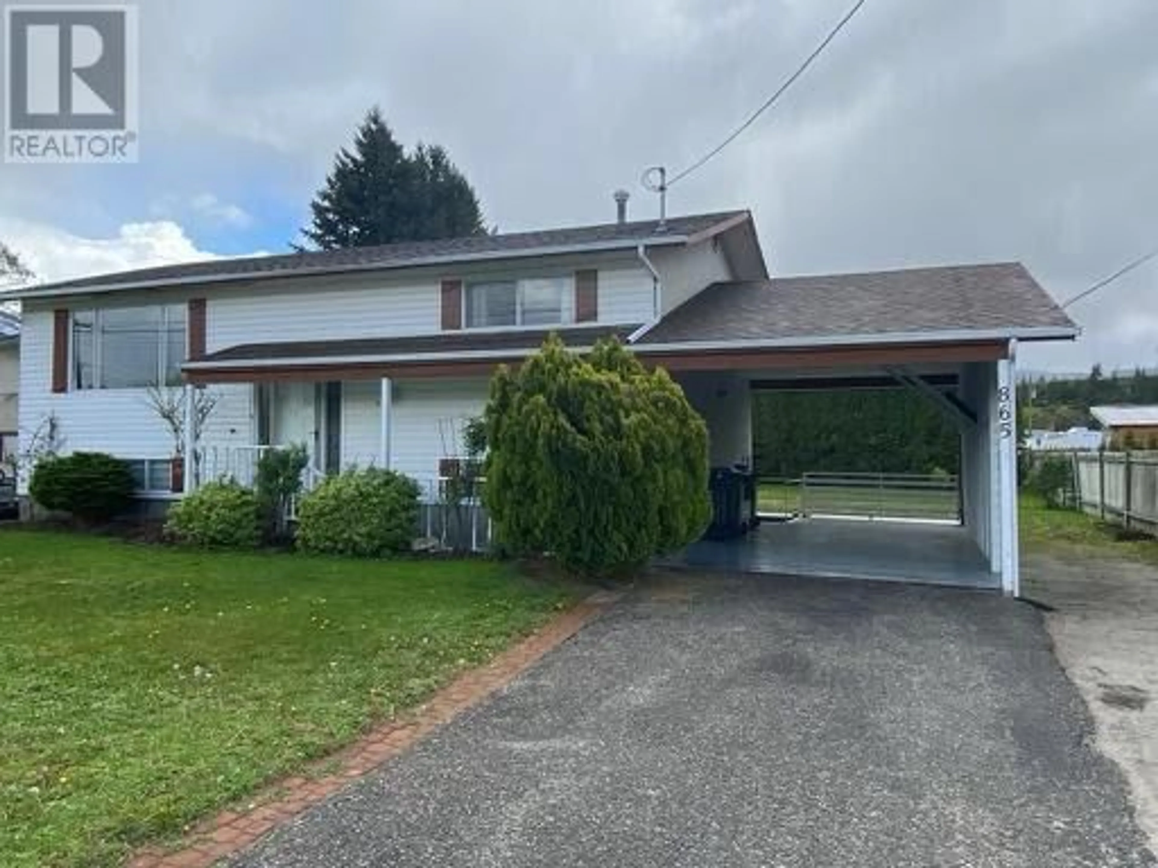 Home with vinyl exterior material, street for 865 QUIGLEY ROAD, Kelowna British Columbia V1X1A9