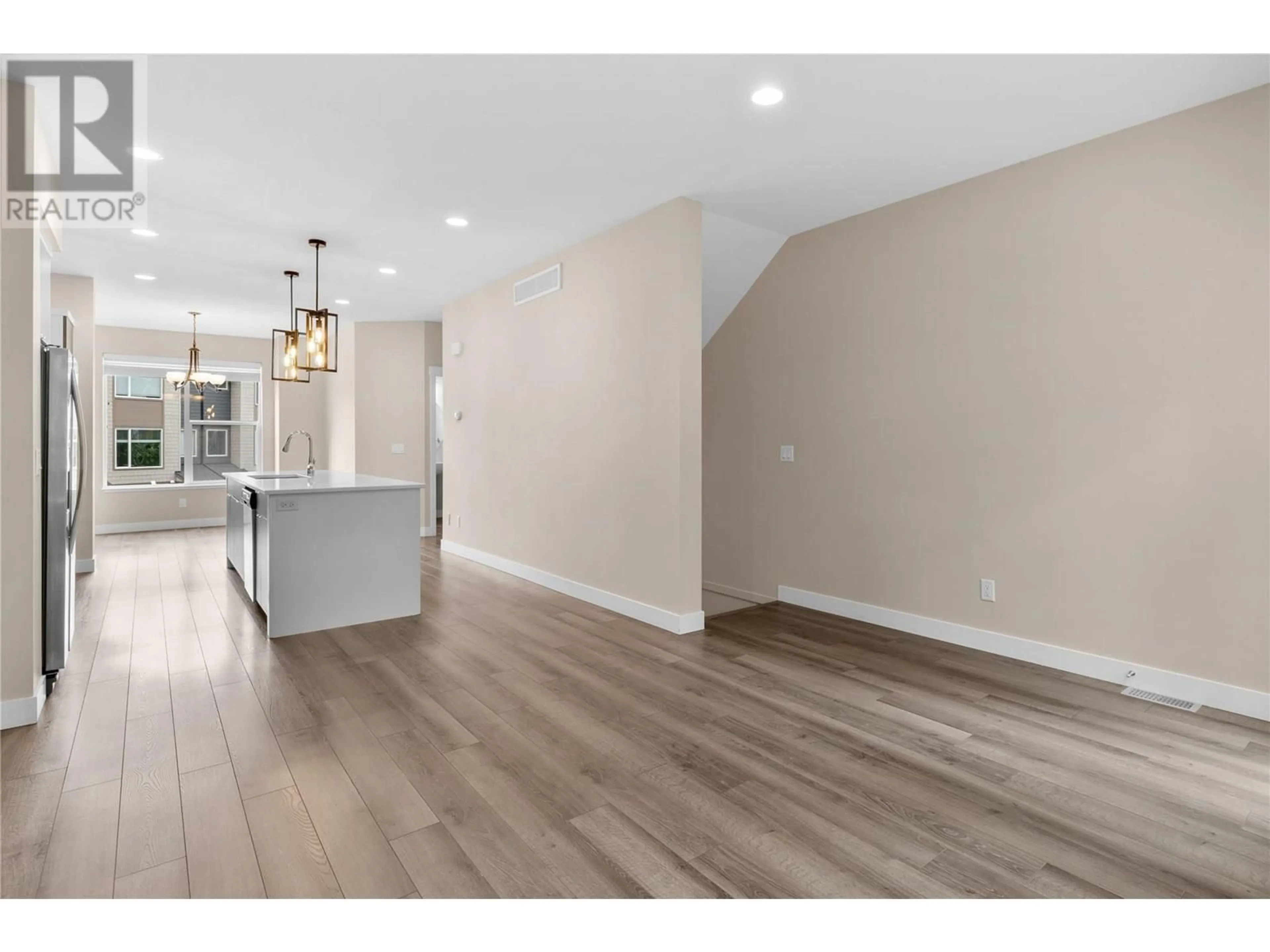 Open concept kitchen, wood/laminate floor for 39 - 2490 TUSCANY DRIVE, West Kelowna British Columbia V4T3M4