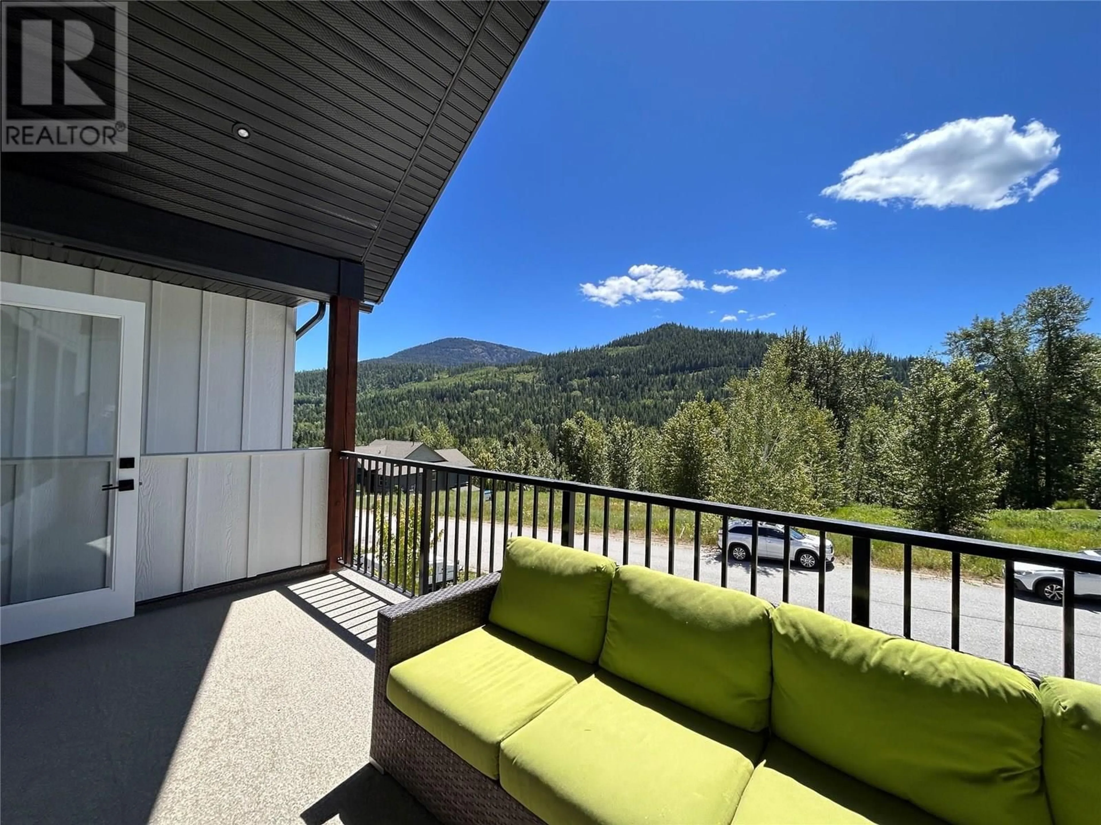 Patio, mountain view for 914 REDSTONE DRIVE, Rossland British Columbia V0G1Y0