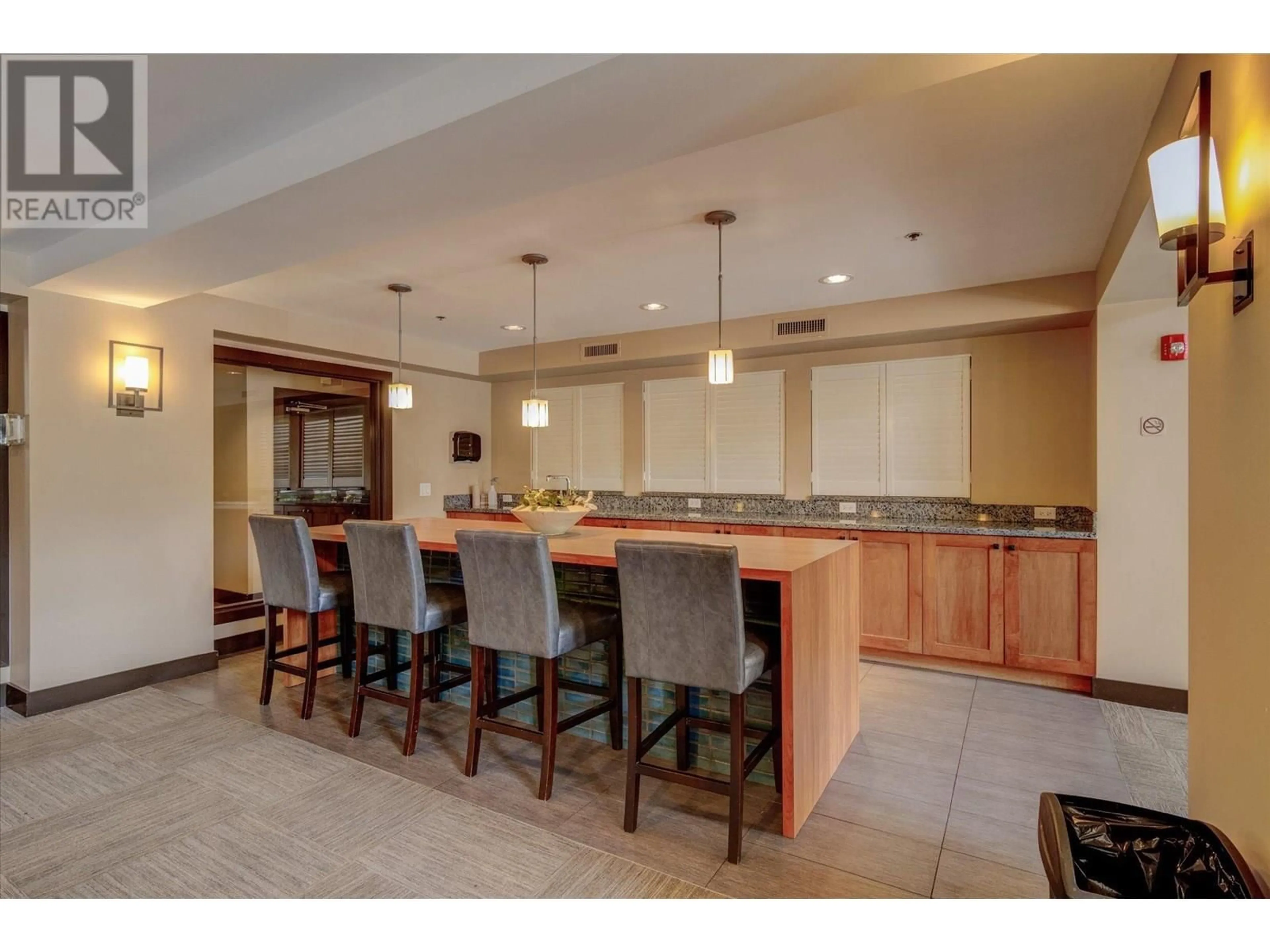 Open concept kitchen, ceramic/tile floor for 310 - 1083 SUNSET DRIVE, Kelowna British Columbia V1Y9Z1