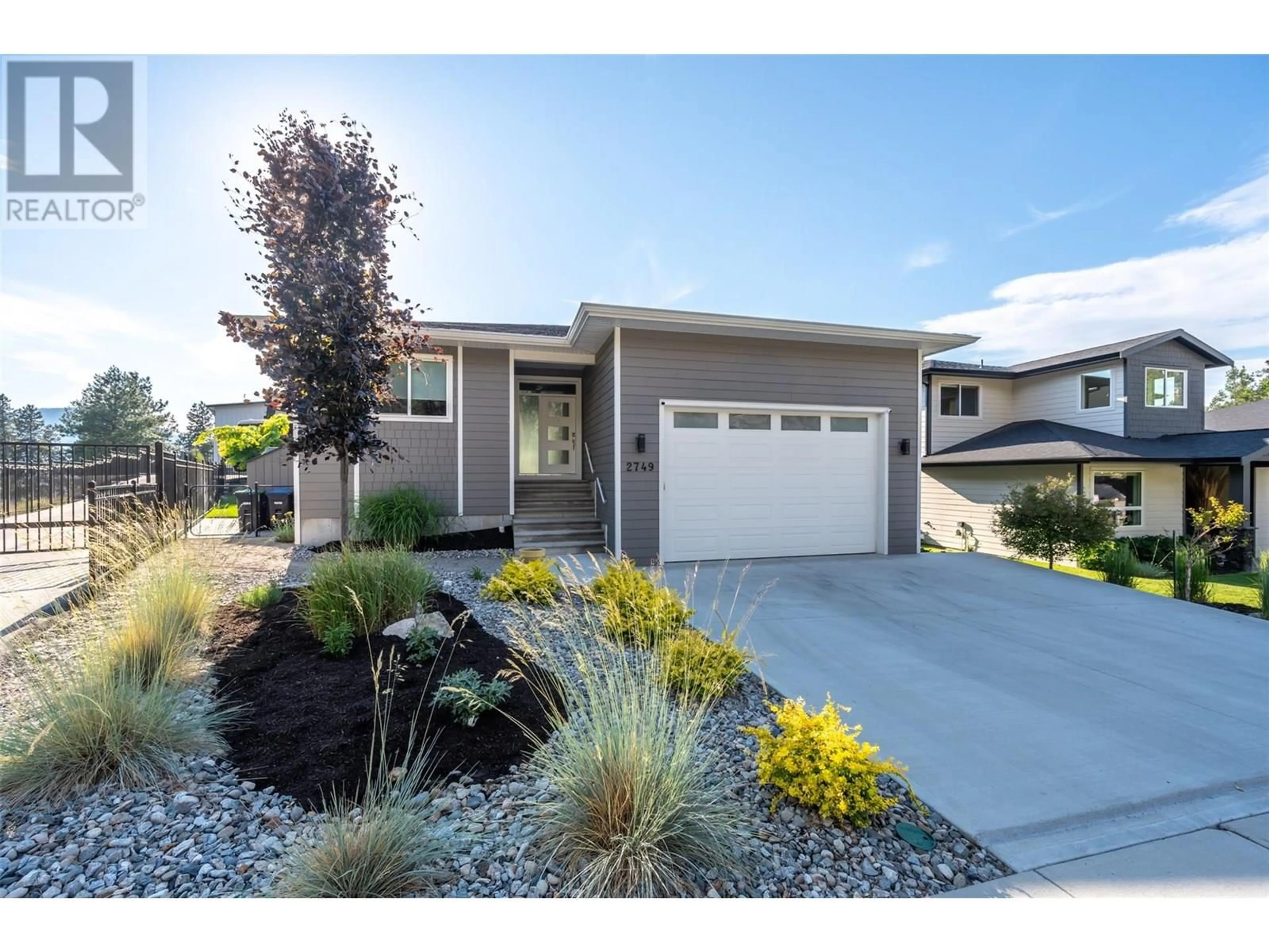 Home with vinyl exterior material, street for 2749 EVERGREEN DRIVE, Penticton British Columbia V2A8L5