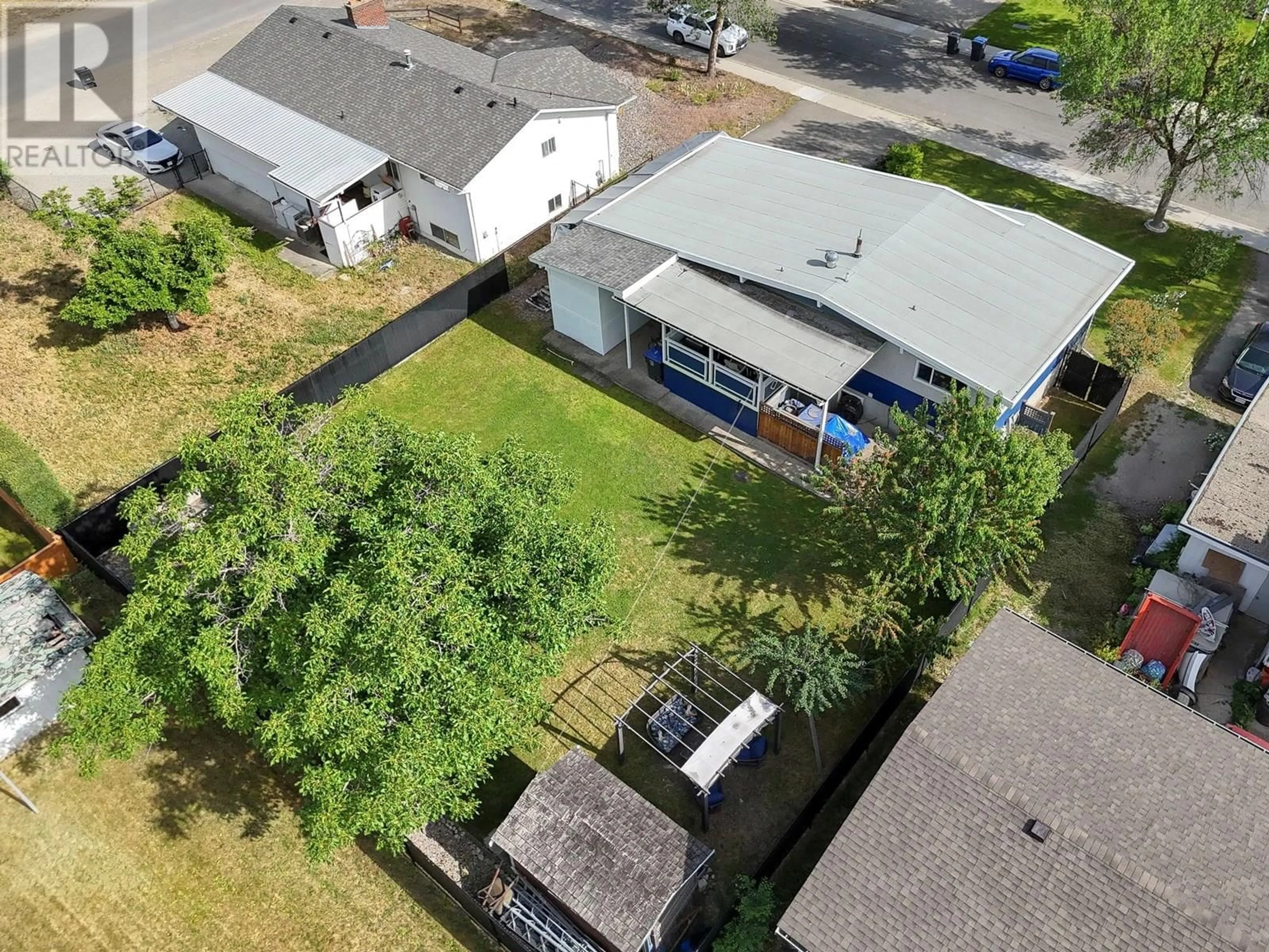 A pic from outside/outdoor area/front of a property/back of a property/a pic from drone, street for 190 BENCHVIEW ROAD, Kelowna British Columbia V1X1M5