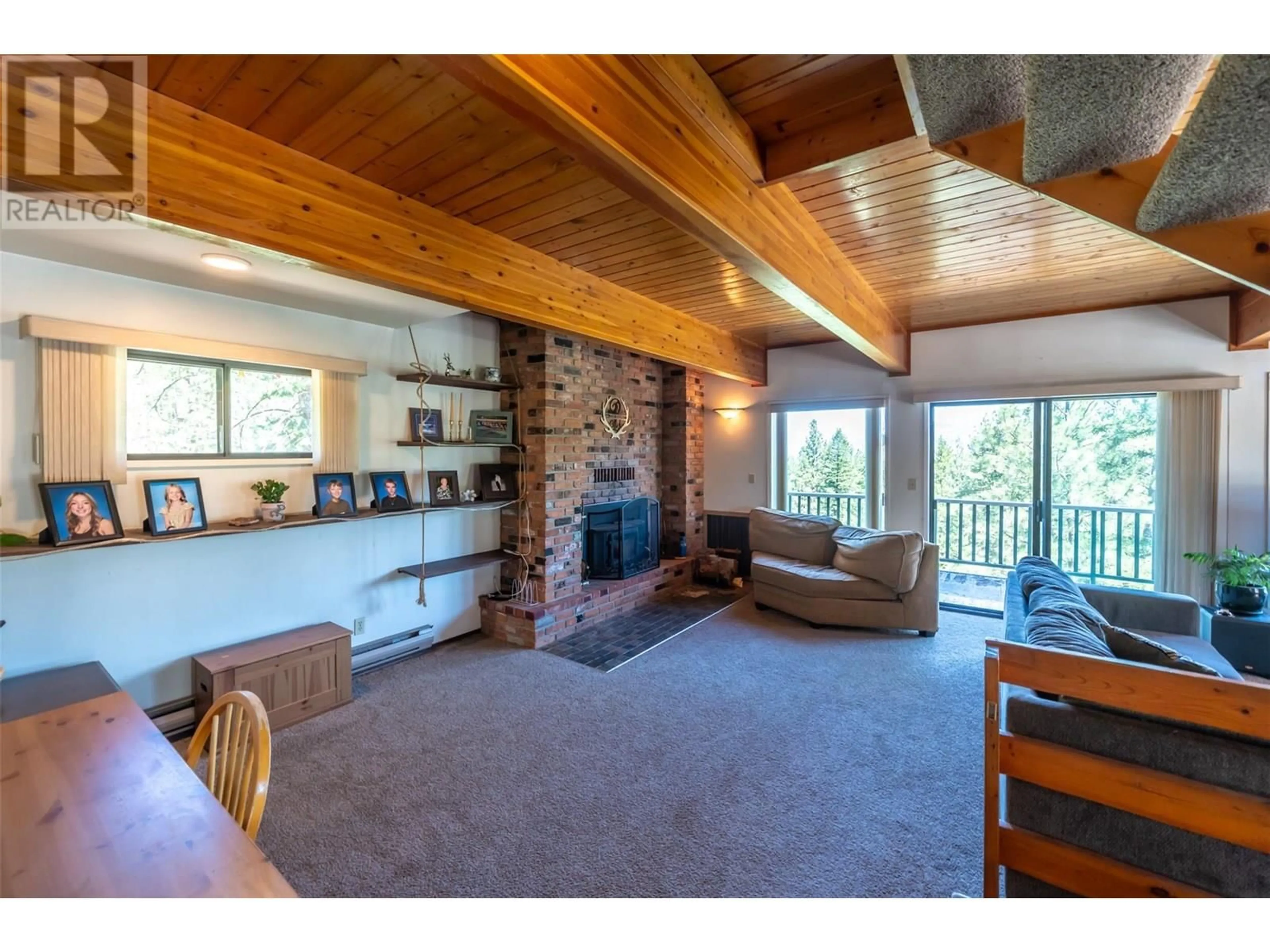 Living room with furniture, wood/laminate floor for 127 PARTINGTON ROAD, Kaleden British Columbia V0H1K0