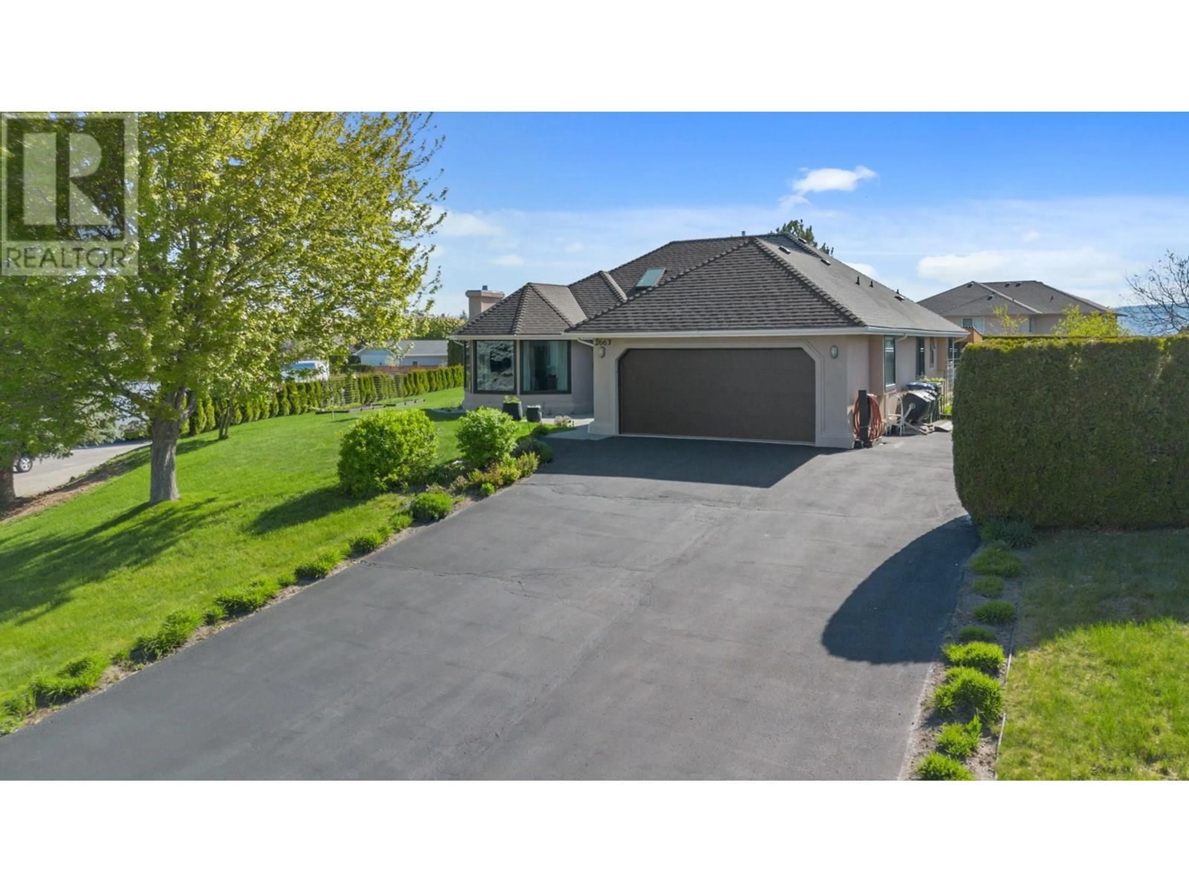 A pic from outside/outdoor area/front of a property/back of a property/a pic from drone, street for 2663 PAULA ROAD, West Kelowna British Columbia V1Z3L7