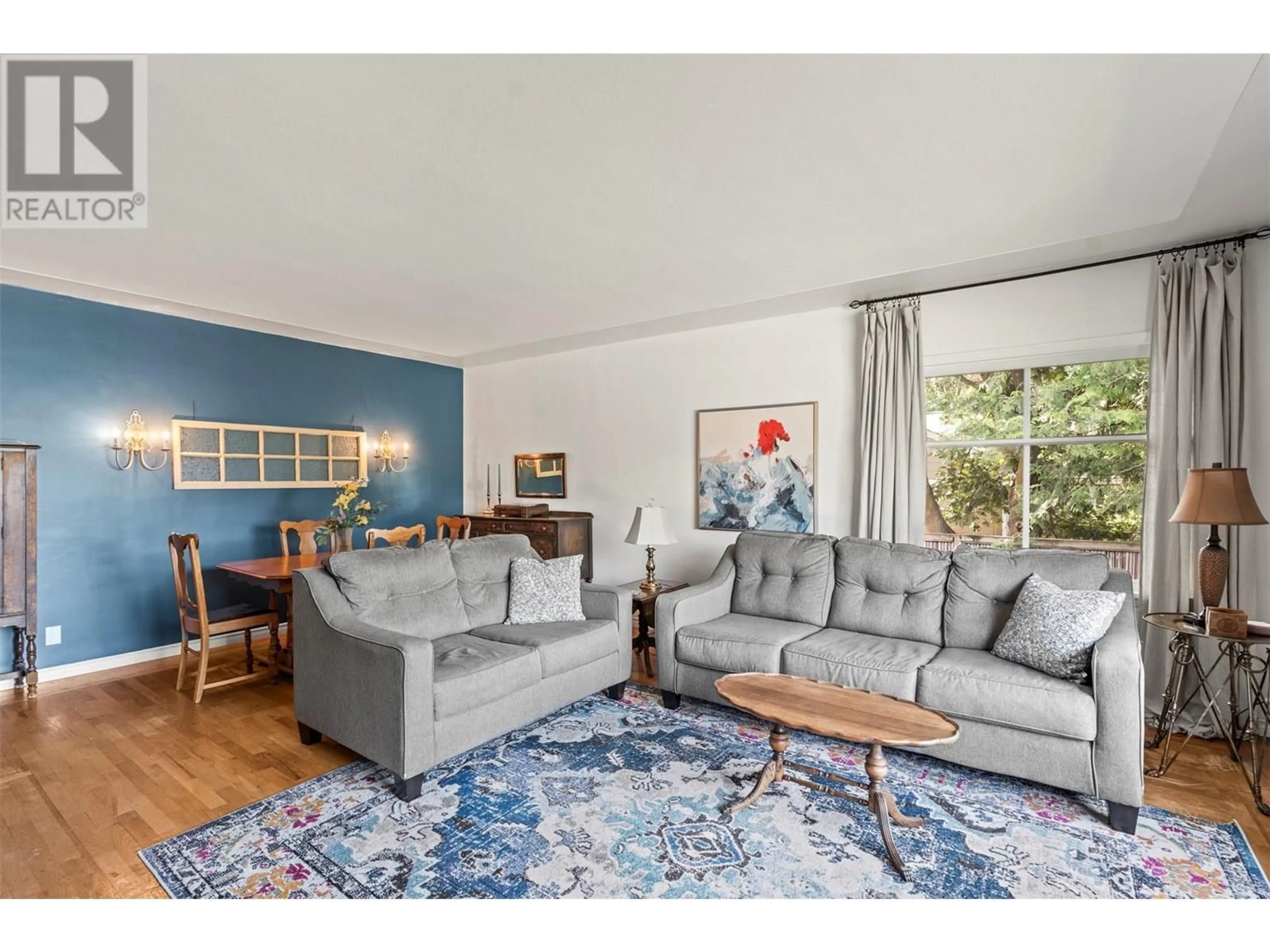 Living room with furniture, unknown for 3401 20 STREET, Vernon British Columbia V1T4C6