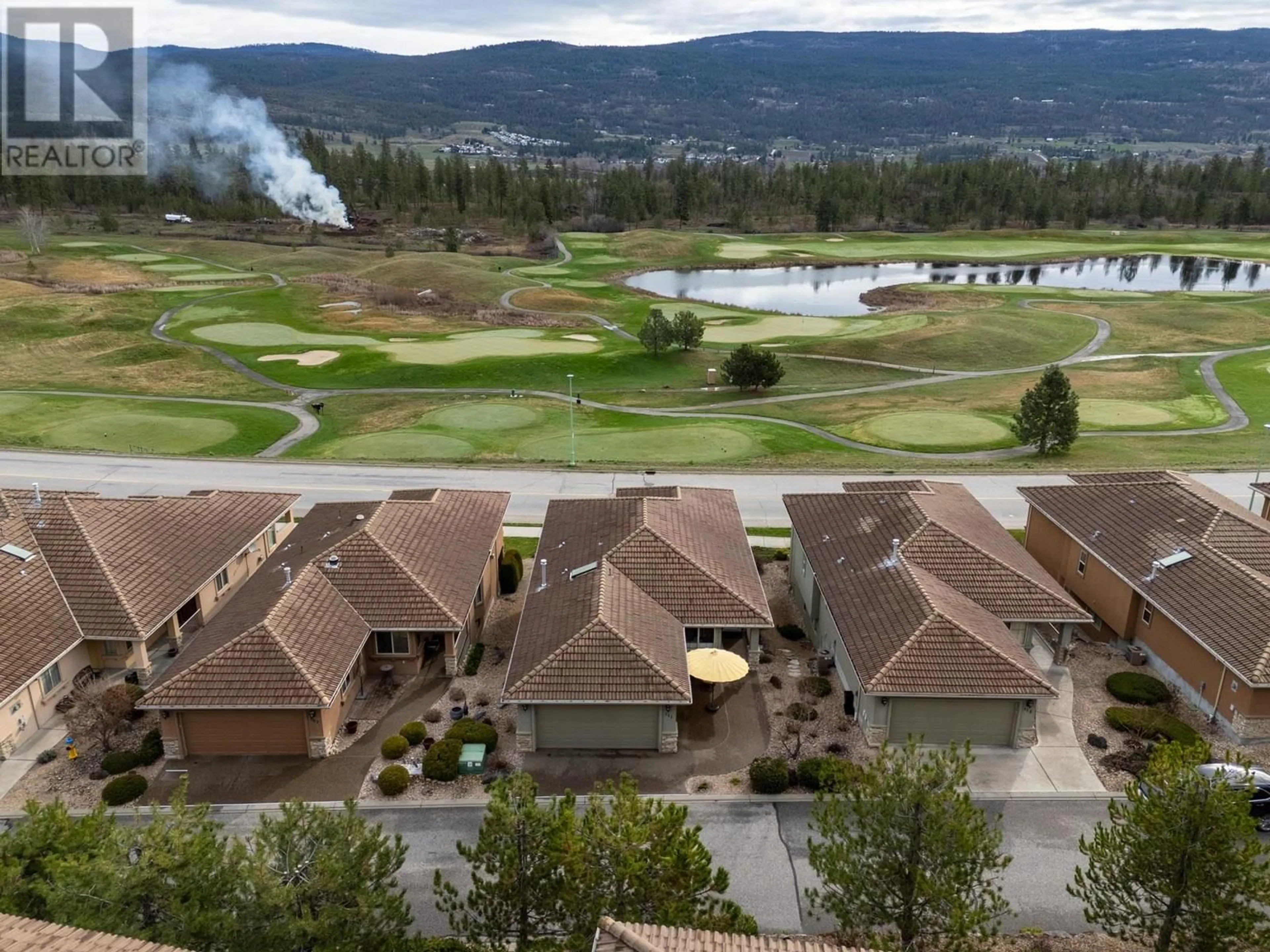 A pic from outside/outdoor area/front of a property/back of a property/a pic from drone, unknown for 111 - 2455 QUAIL RIDGE BOULEVARD, Kelowna British Columbia V1V2S8