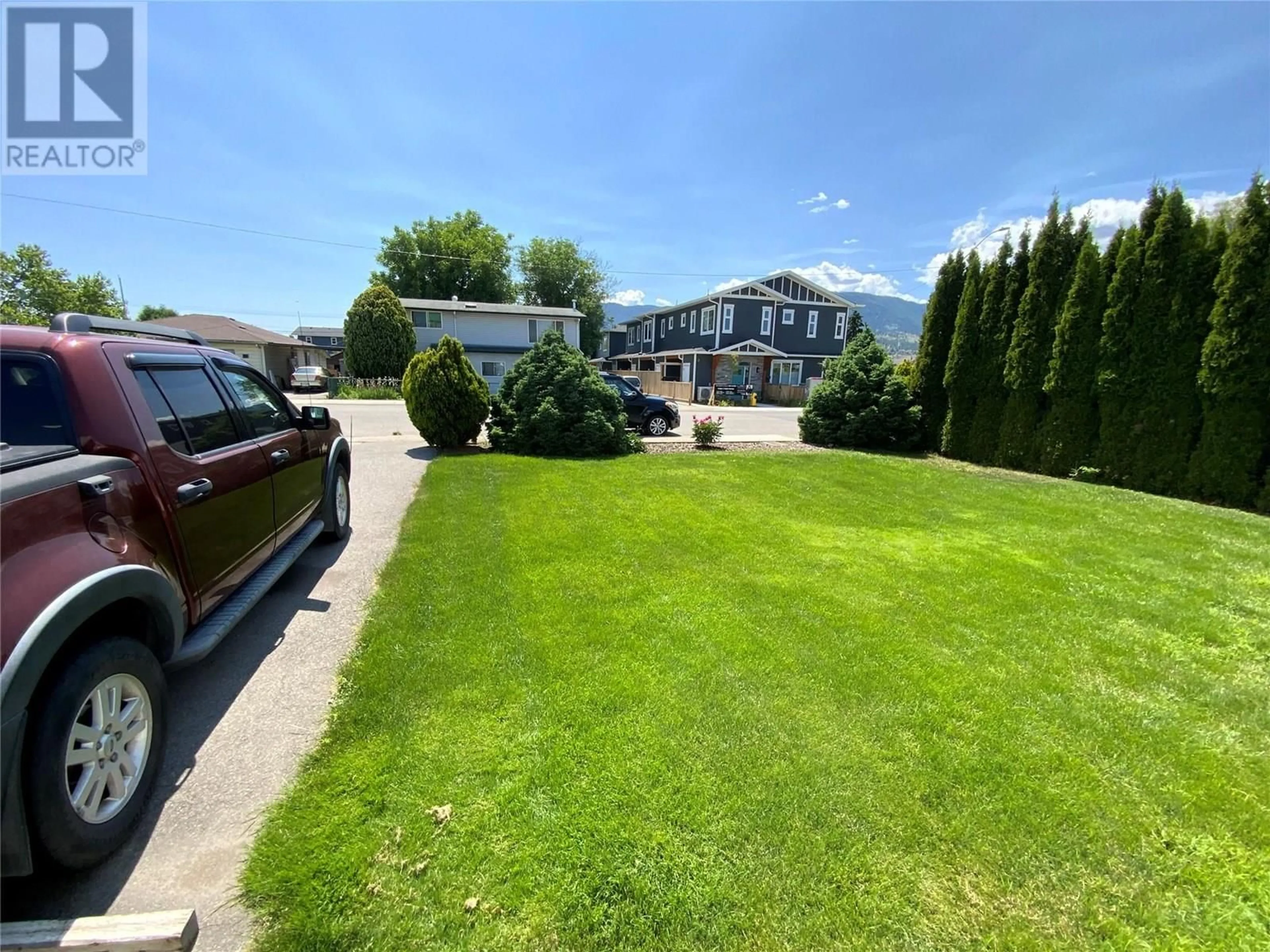 A pic from outside/outdoor area/front of a property/back of a property/a pic from drone, mountain view for 449 CONKLIN AVENUE, Penticton British Columbia V2A2T3