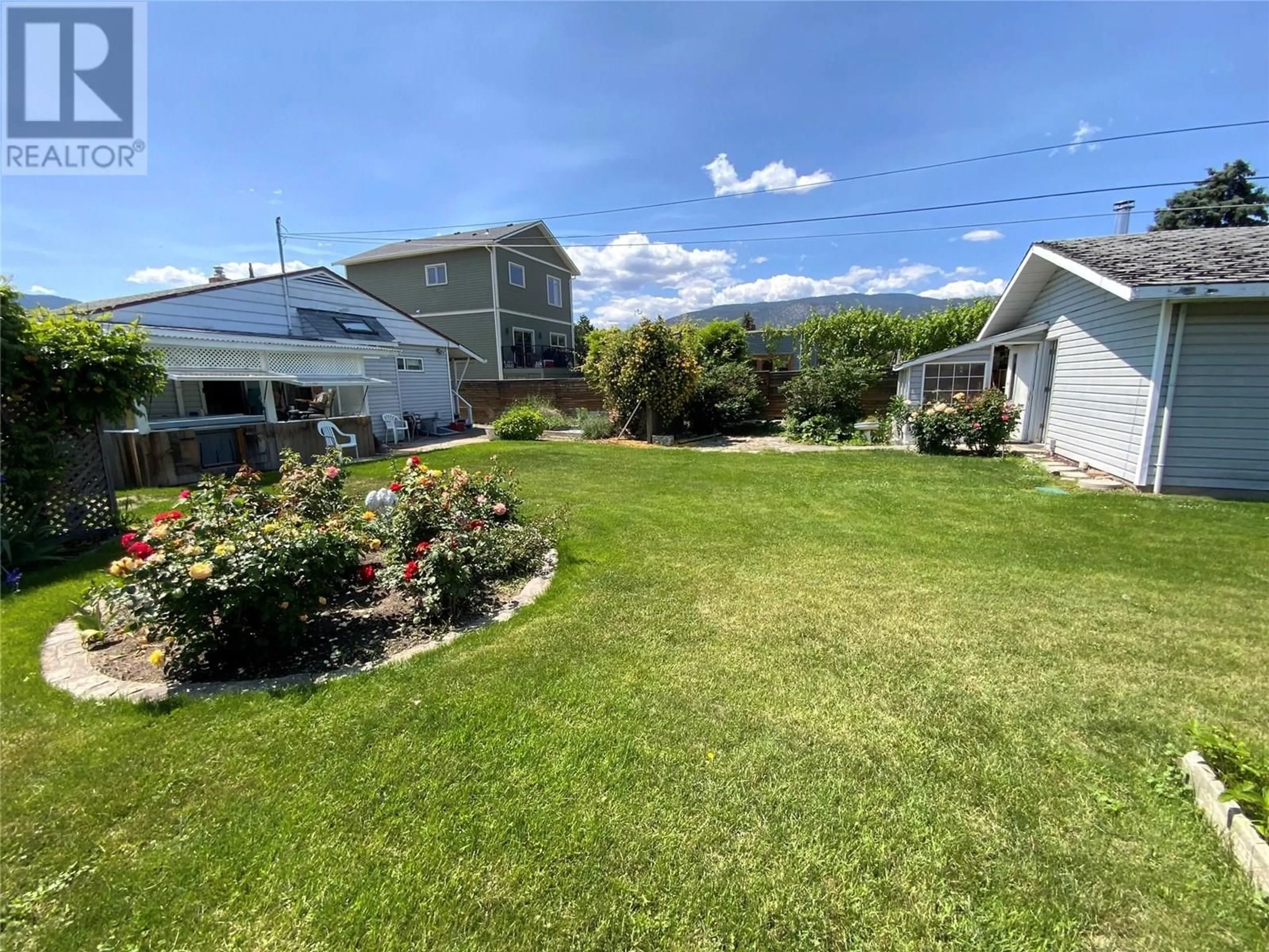 A pic from outside/outdoor area/front of a property/back of a property/a pic from drone, water/lake/river/ocean view for 449 CONKLIN AVENUE, Penticton British Columbia V2A2T3