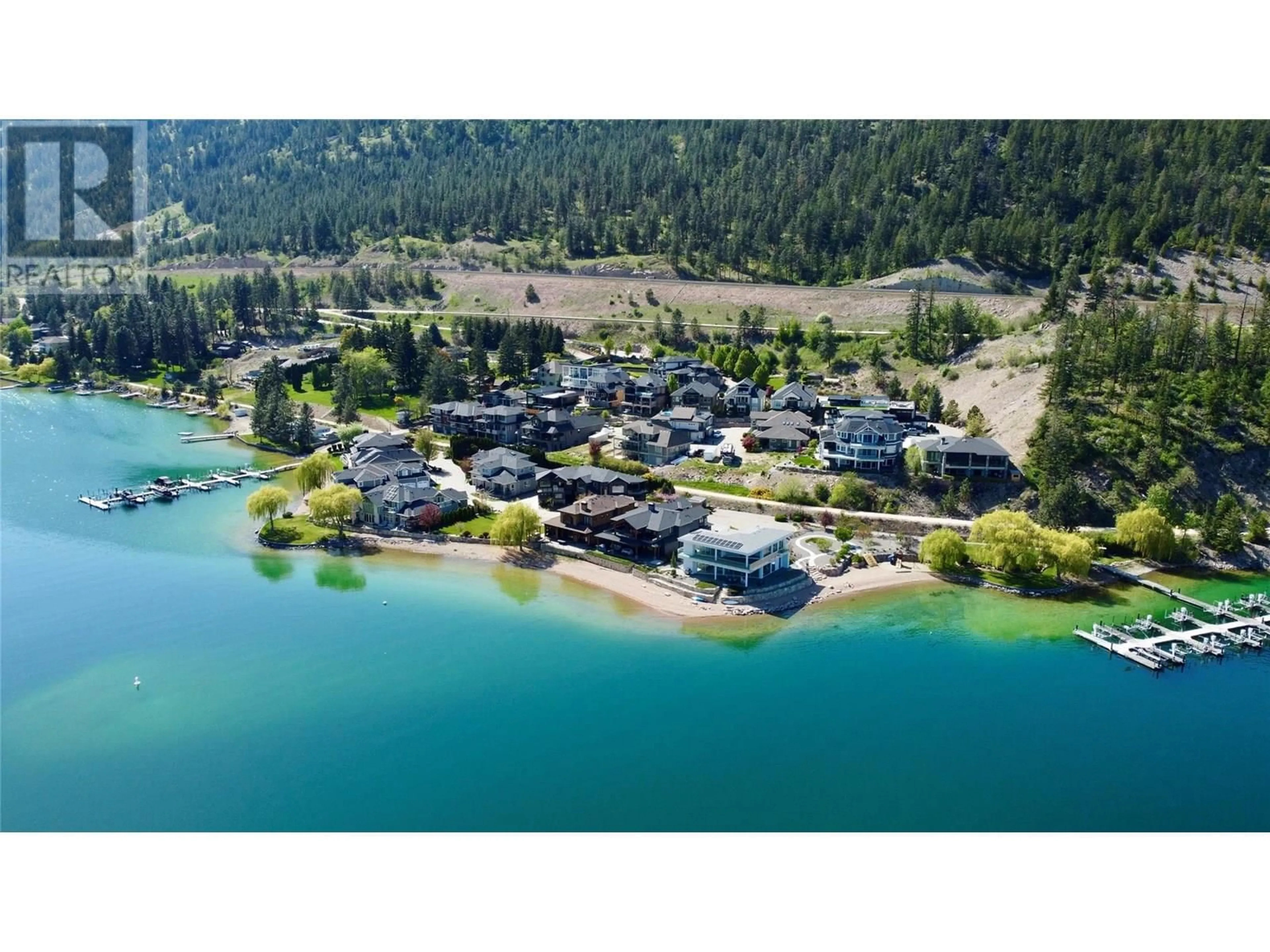 A pic from outside/outdoor area/front of a property/back of a property/a pic from drone, water/lake/river/ocean view for 16 - 18451 CRYSTAL WATERS ROAD, Lake Country British Columbia V4V2G2