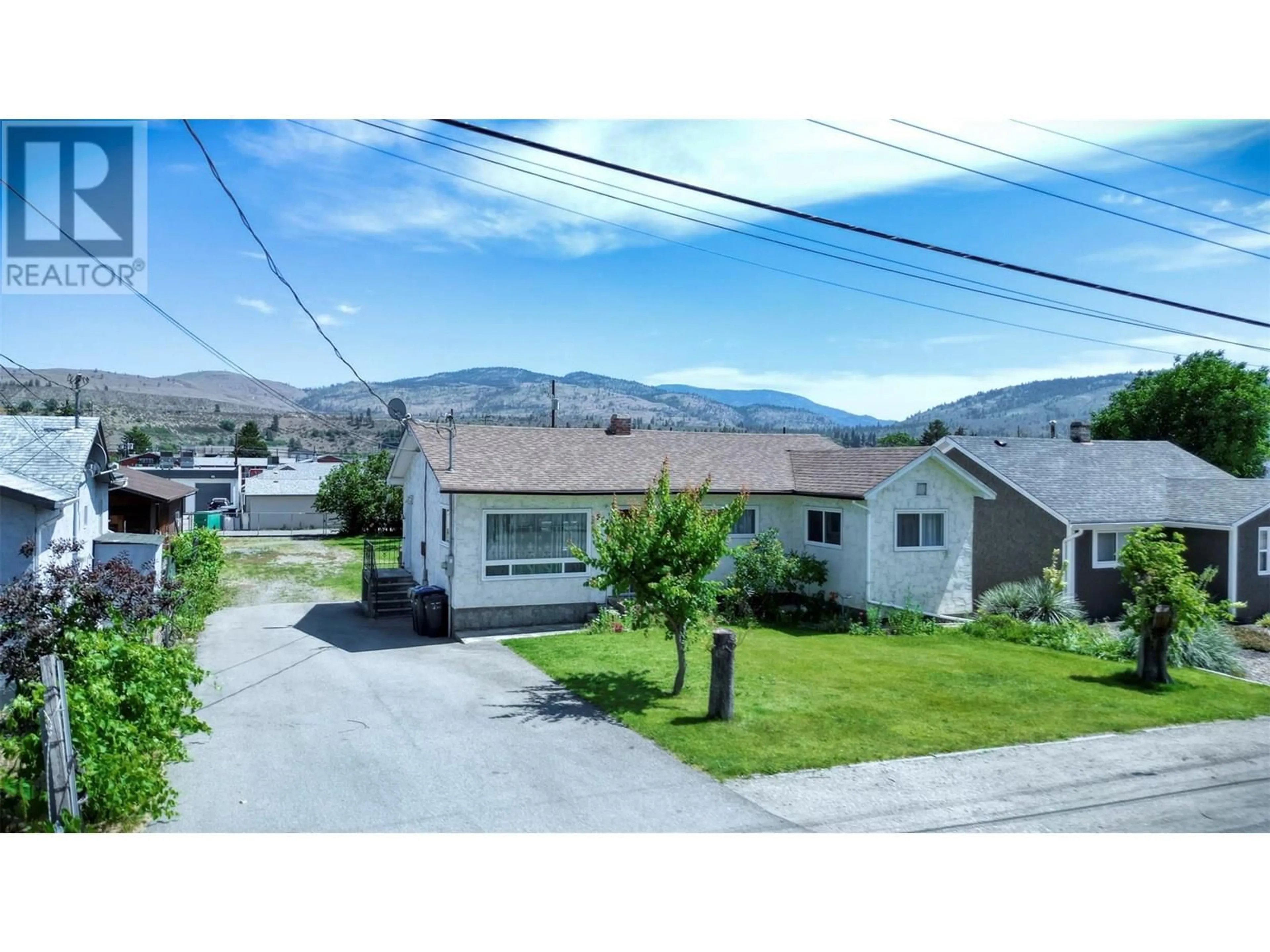 A pic from outside/outdoor area/front of a property/back of a property/a pic from drone, mountain view for 5887 OKANAGAN STREET STREET, Oliver British Columbia V0H1T0