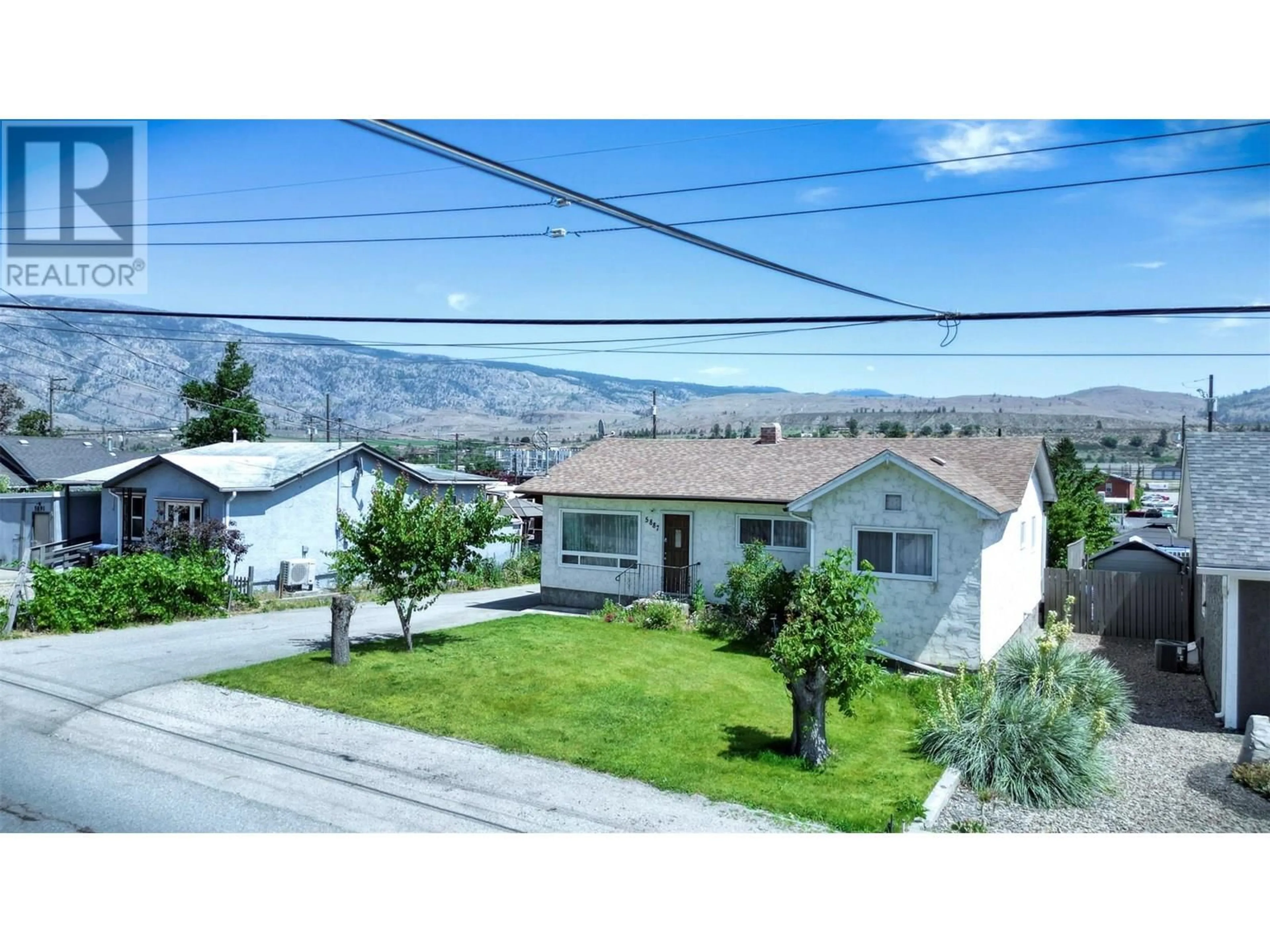 A pic from outside/outdoor area/front of a property/back of a property/a pic from drone, mountain view for 5887 OKANAGAN STREET STREET, Oliver British Columbia V0H1T0