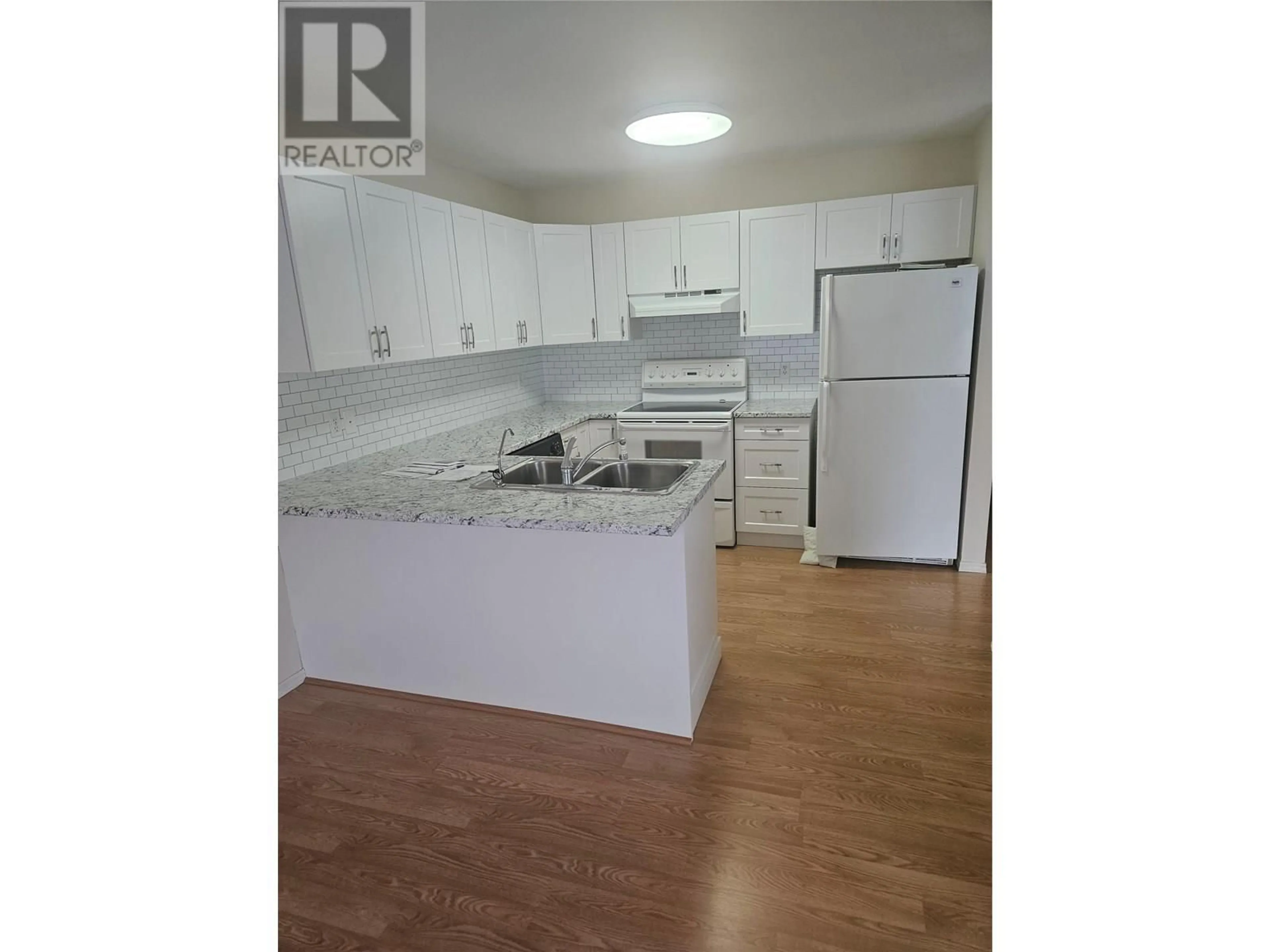 Standard kitchen, wood/laminate floor for 26 - 4600 BELLA VISTA ROAD, Vernon British Columbia V1T2N4