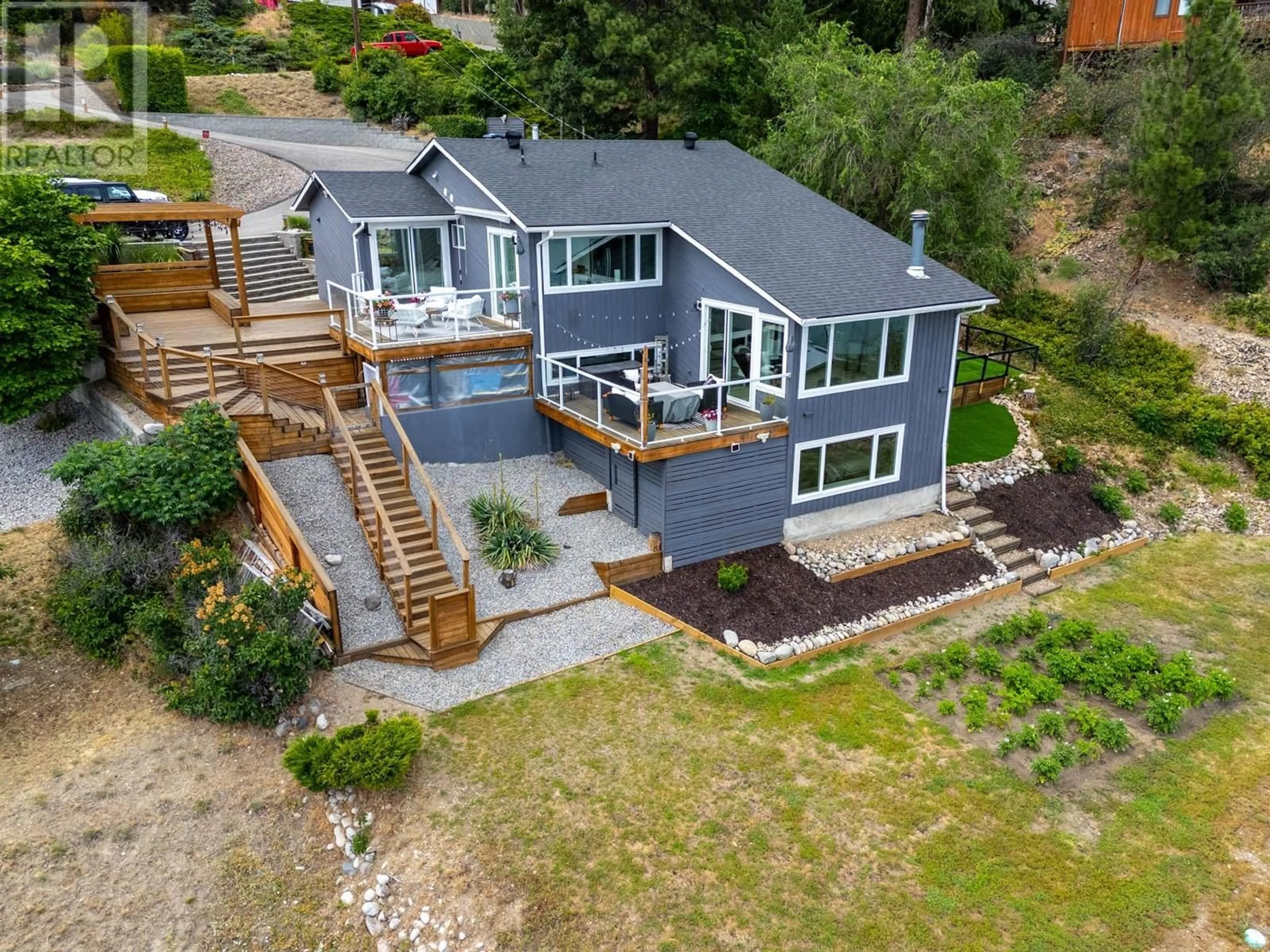 A pic from outside/outdoor area/front of a property/back of a property/a pic from drone, water/lake/river/ocean view for 6427 STUART CRESCENT, Peachland British Columbia V0H1X7