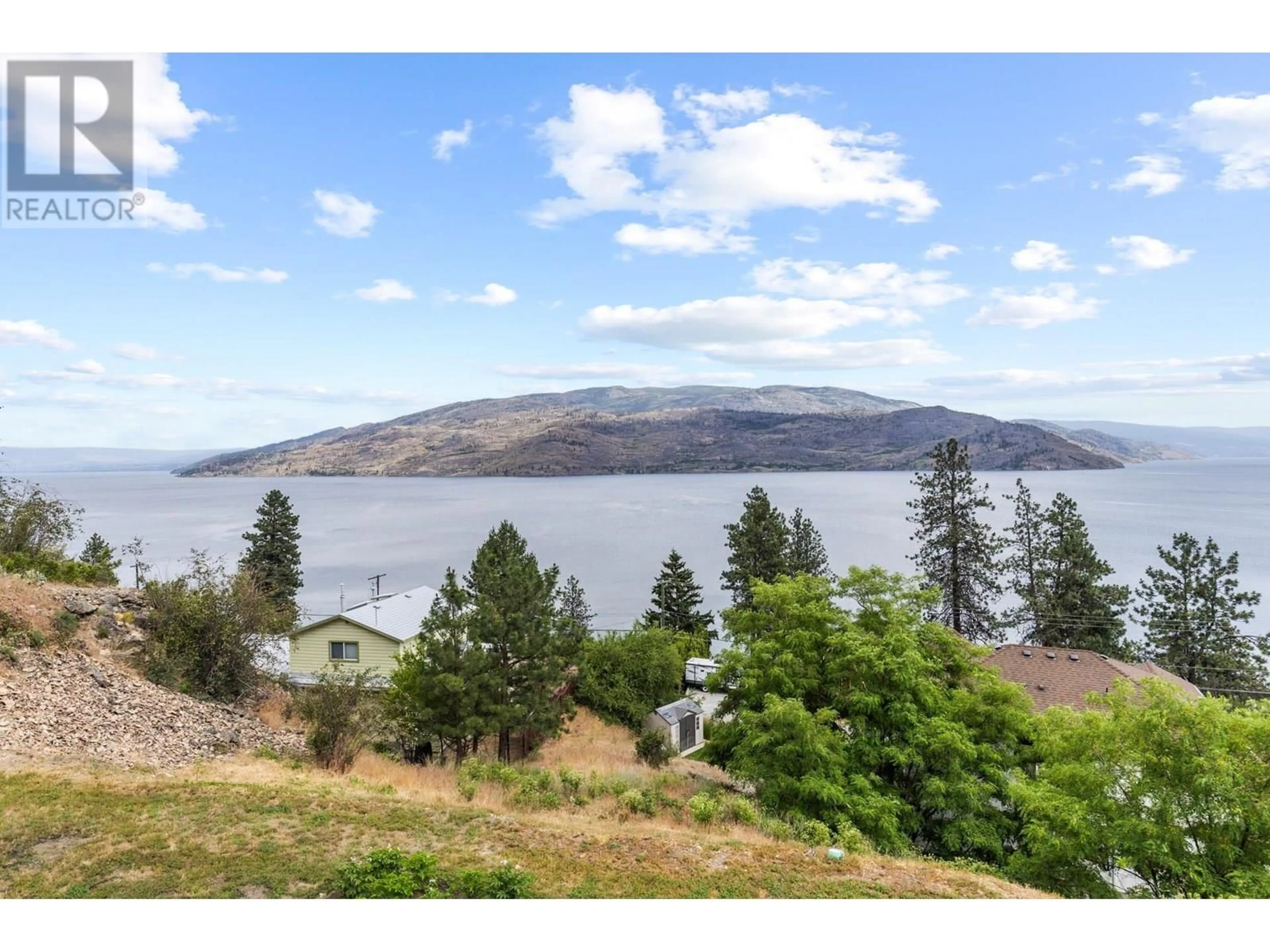 A pic from outside/outdoor area/front of a property/back of a property/a pic from drone, water/lake/river/ocean view for 6427 STUART CRESCENT, Peachland British Columbia V0H1X7