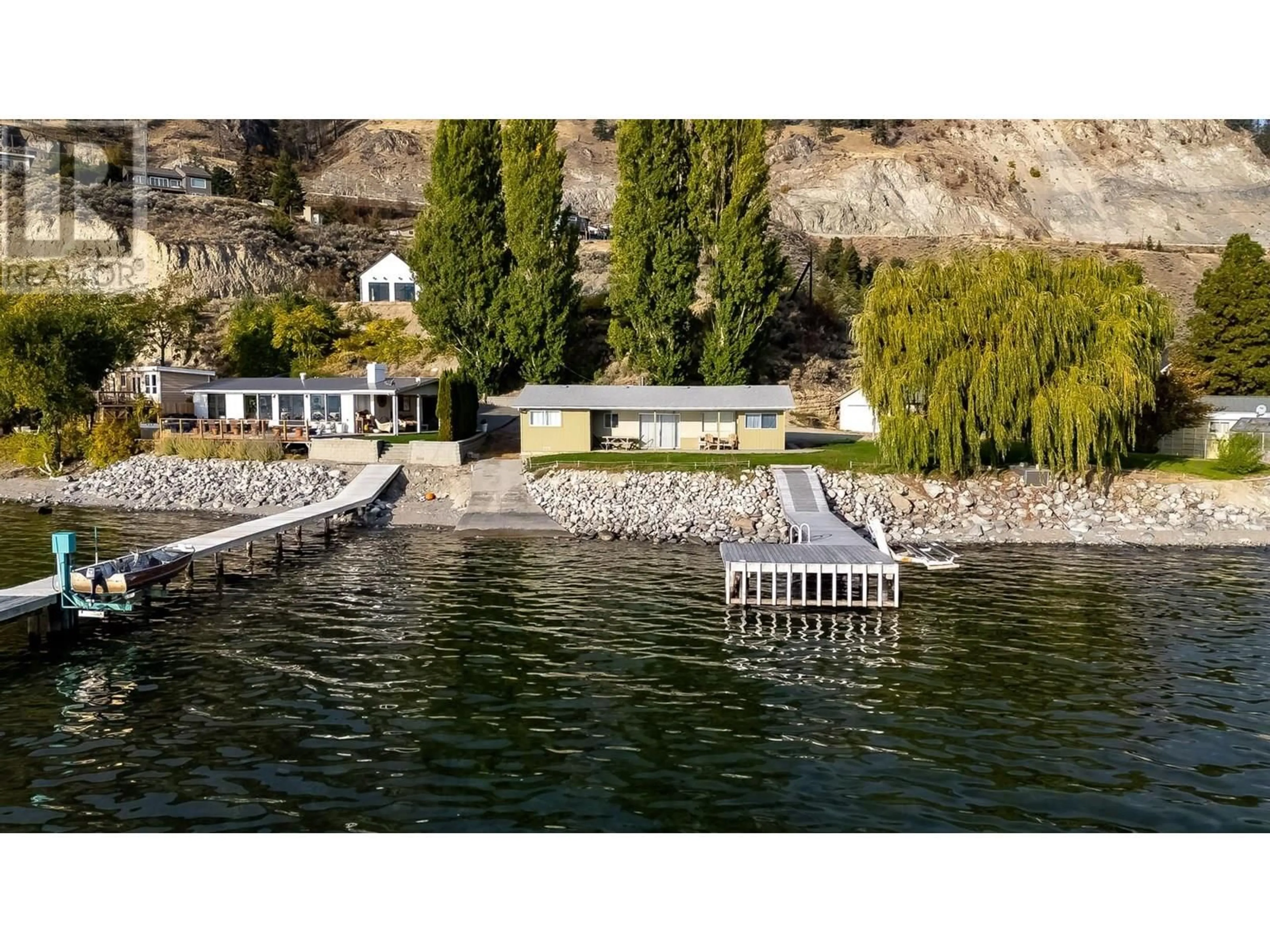 A pic from outside/outdoor area/front of a property/back of a property/a pic from drone, water/lake/river/ocean view for 475 NORTH BEACH ROAD, Summerland British Columbia V0H1Z6