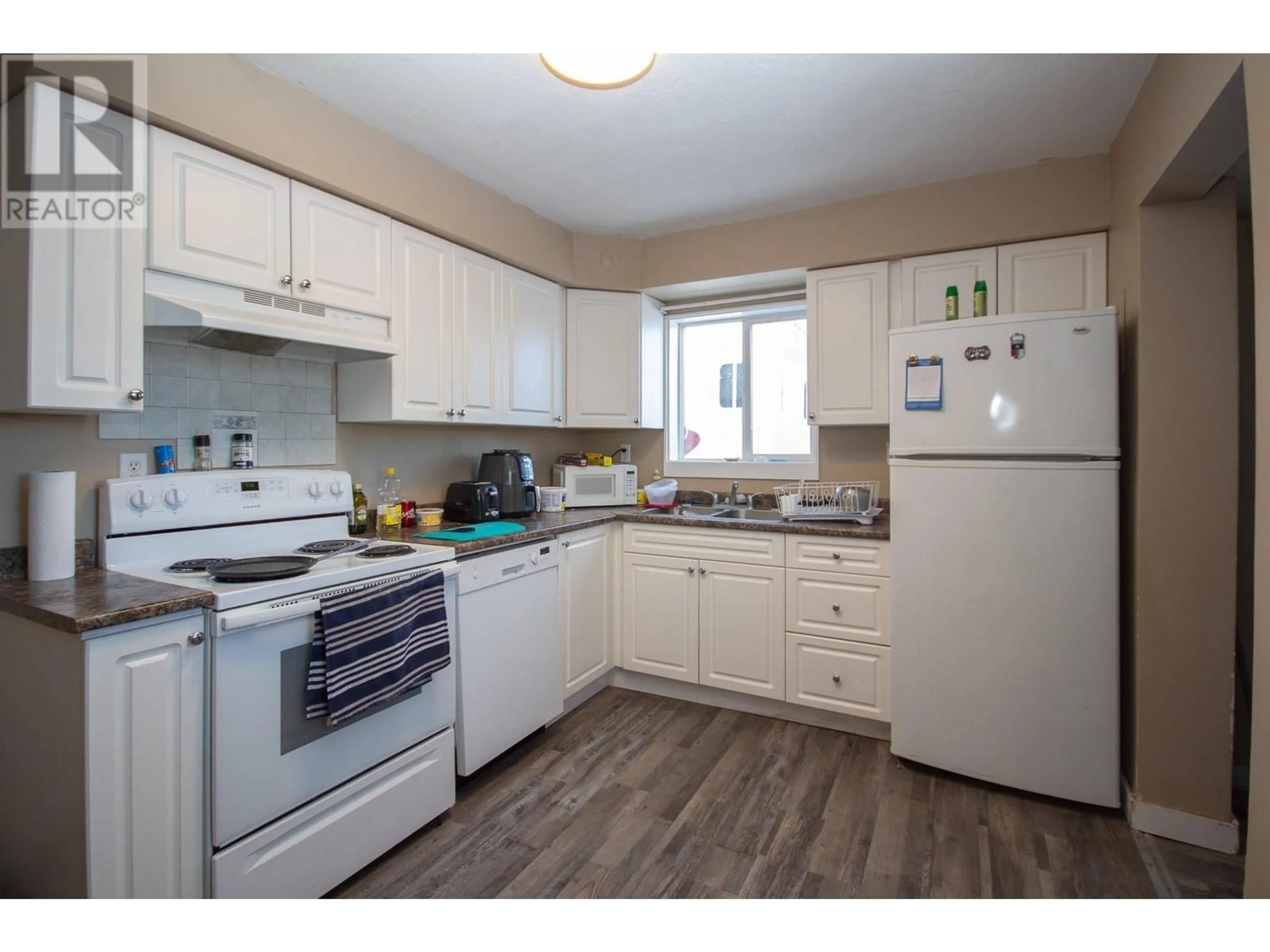 Standard kitchen, wood/laminate floor for 4908 47 AVENUE, Pouce Coupe British Columbia V0C2C0