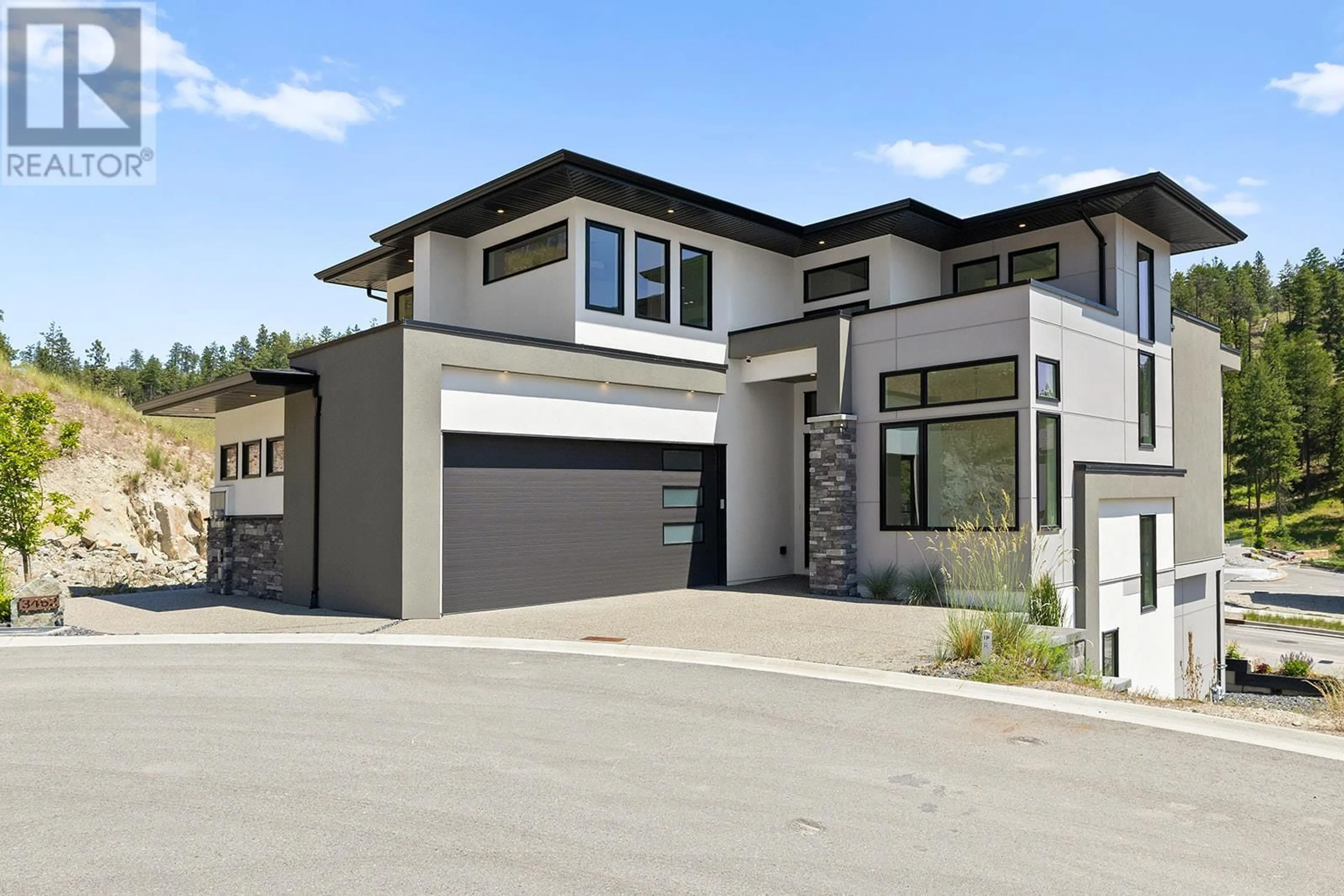 Home with brick exterior material, street for 3462 HILLTOWN CLOSE, Kelowna British Columbia V1V0H4