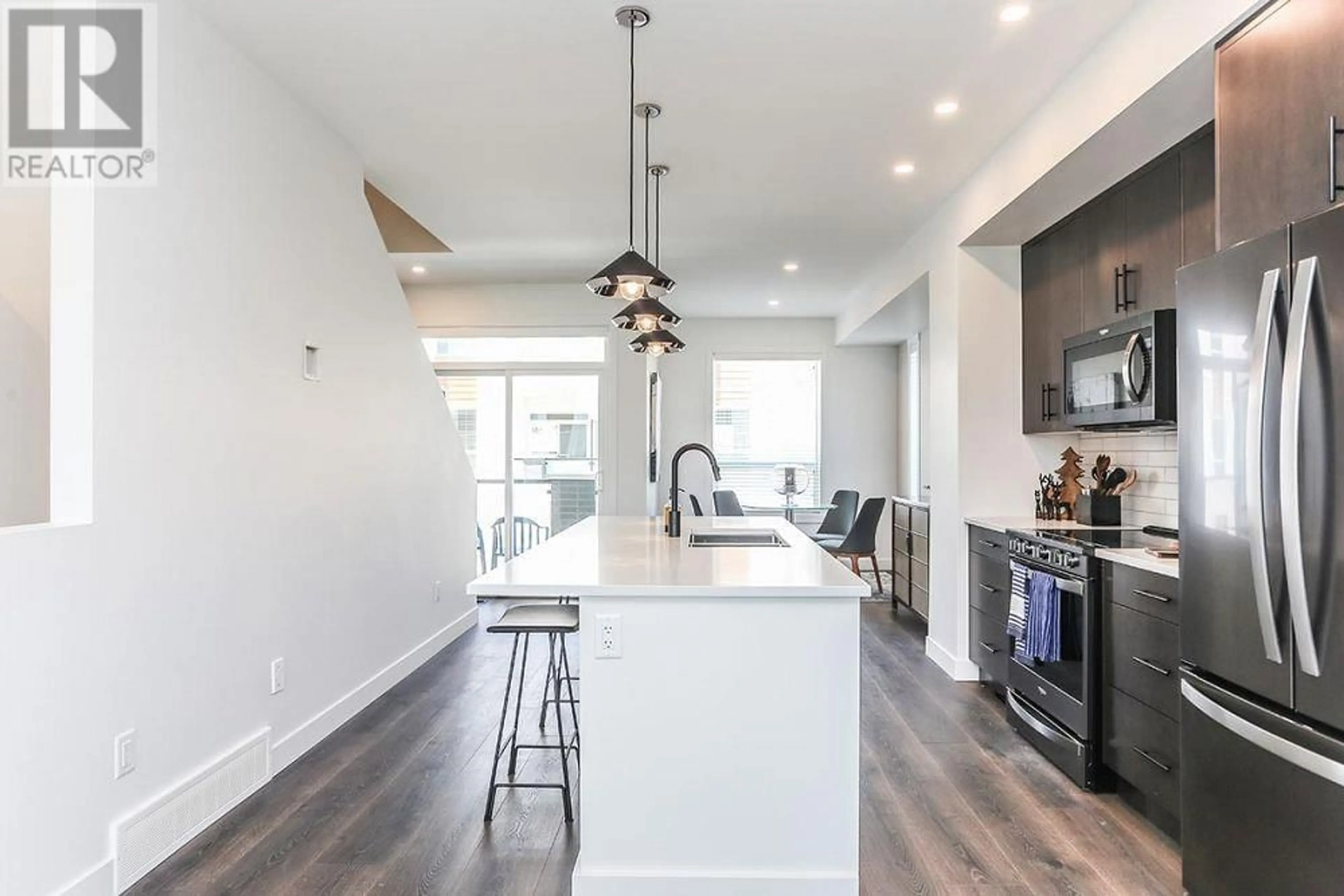 Open concept kitchen, unknown for 363 - 610 ACADEMY WAY, Kelowna British Columbia V1V0E8
