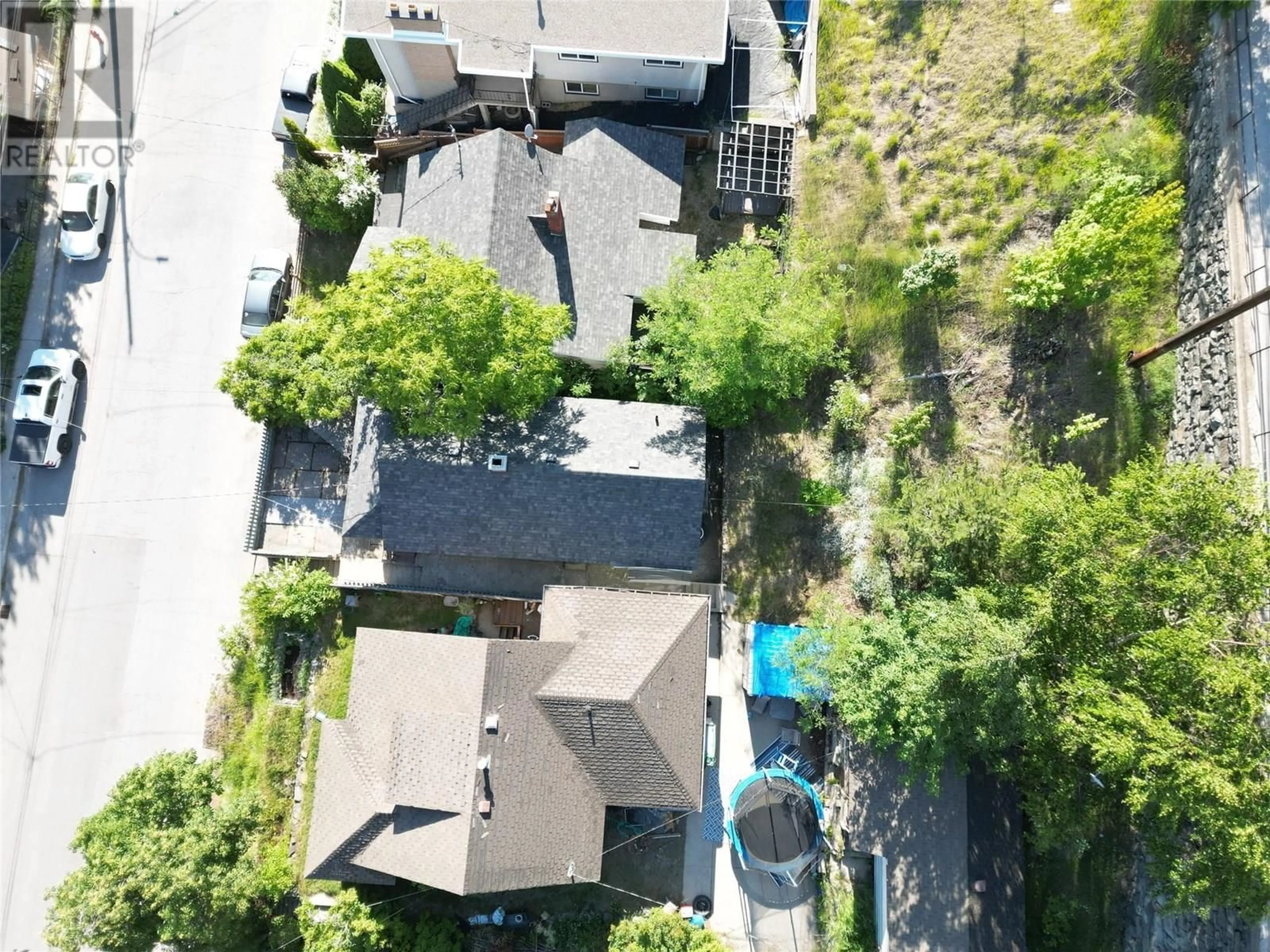 A pic from outside/outdoor area/front of a property/back of a property/a pic from drone, street for 1816 TOPPING STREET, Trail British Columbia V1R4G4