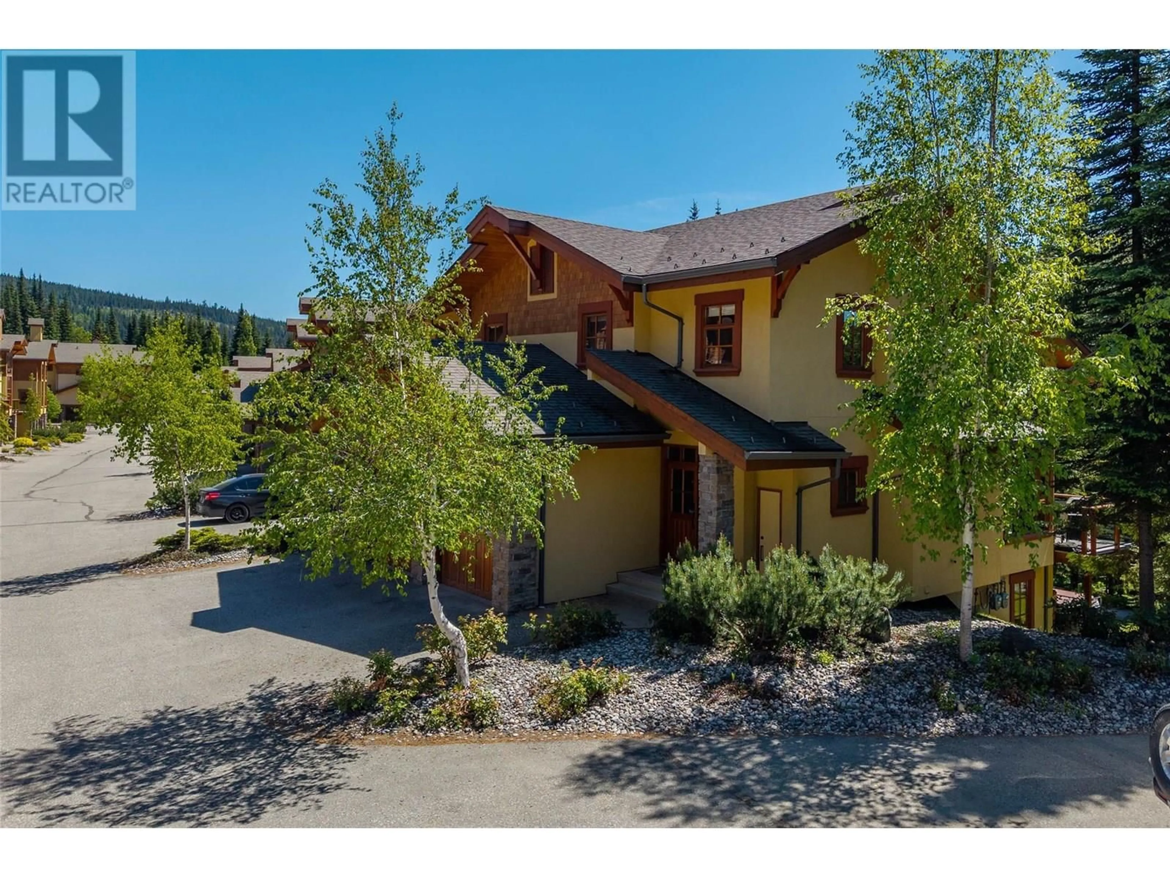 A pic from outside/outdoor area/front of a property/back of a property/a pic from drone, unknown for 7 - 5000 SUN PEAKS ROAD, Sun Peaks British Columbia V0E5N0