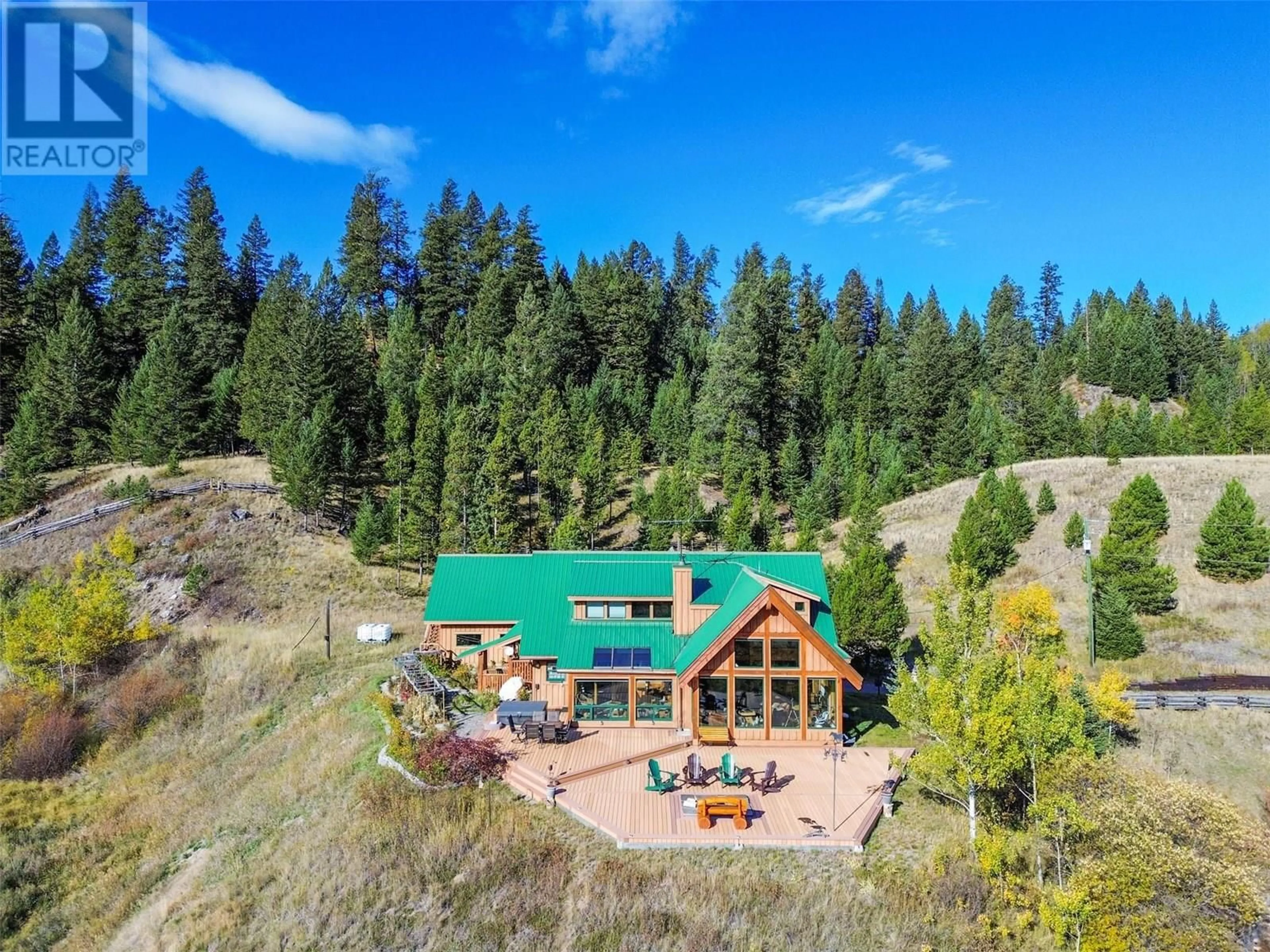 A pic from outside/outdoor area/front of a property/back of a property/a pic from drone, mountain view for 7020 BROLIN ROAD, Logan Lake British Columbia V0K1W0